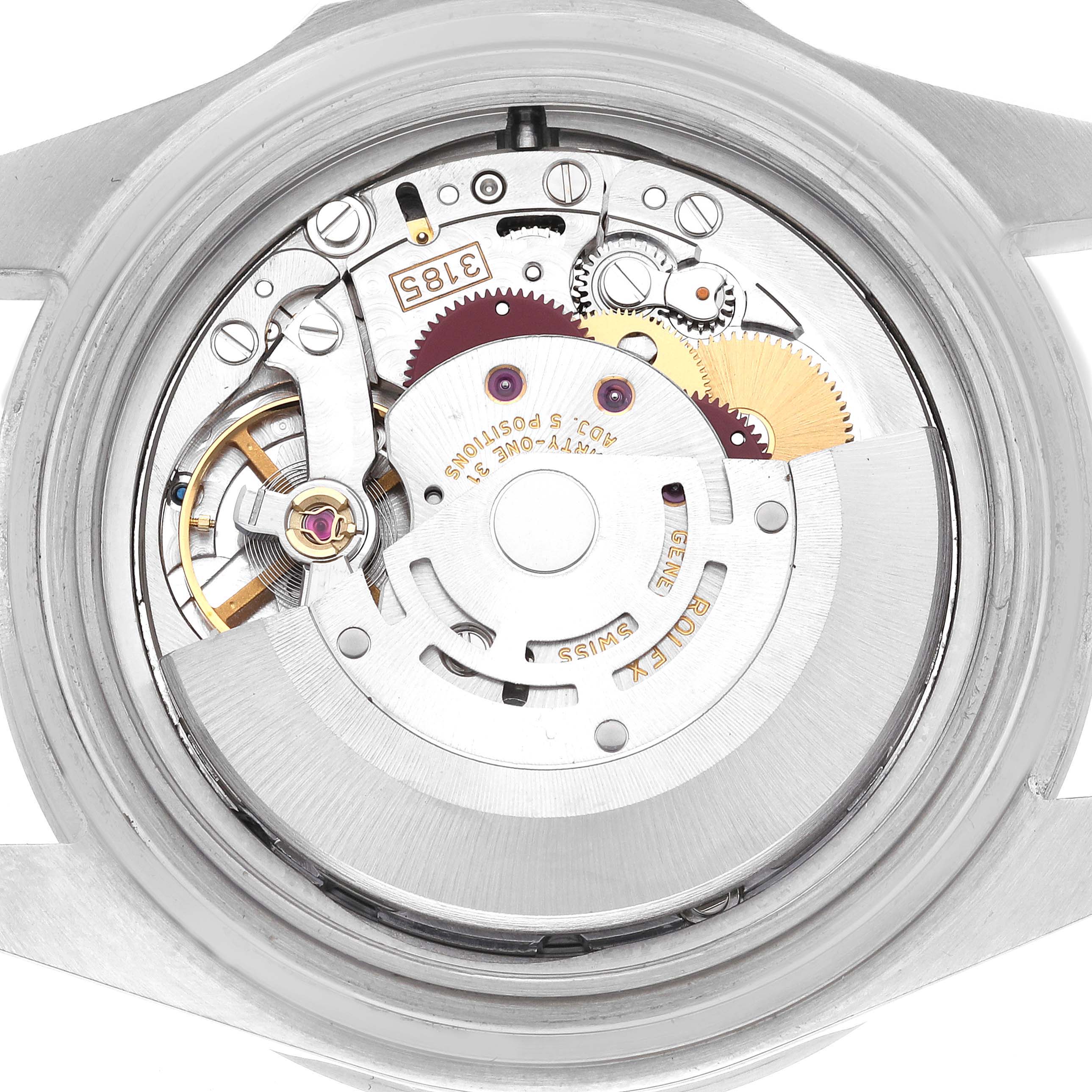 This image shows the movement of a Rolex Explorer 16570 Men
s Stainless Steel White Dial 16570 Men
s Stainless Steel White Dial watch from a rear angle, highlighting gears and rotors.