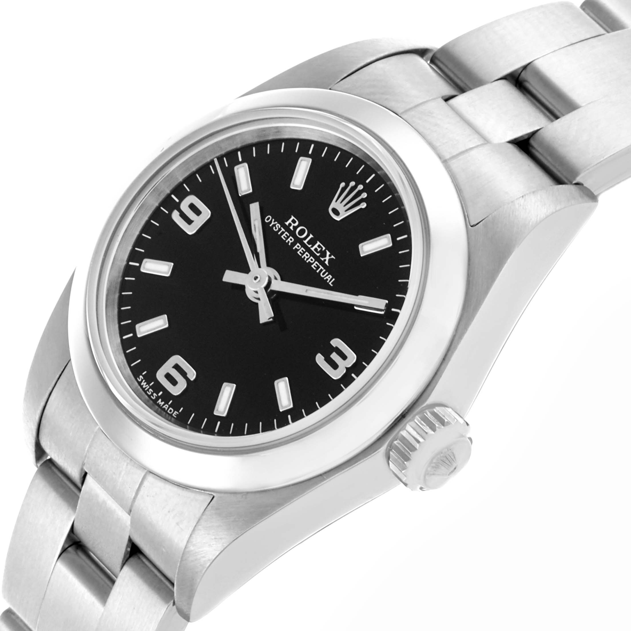 The Rolex Oyster Perpetual 76080 Women's Stainless Steel Black Dial 76080 Women's Stainless Steel Black Dial watch is shown at an angle displaying the face, bezel, crown, and part of the bracelet.