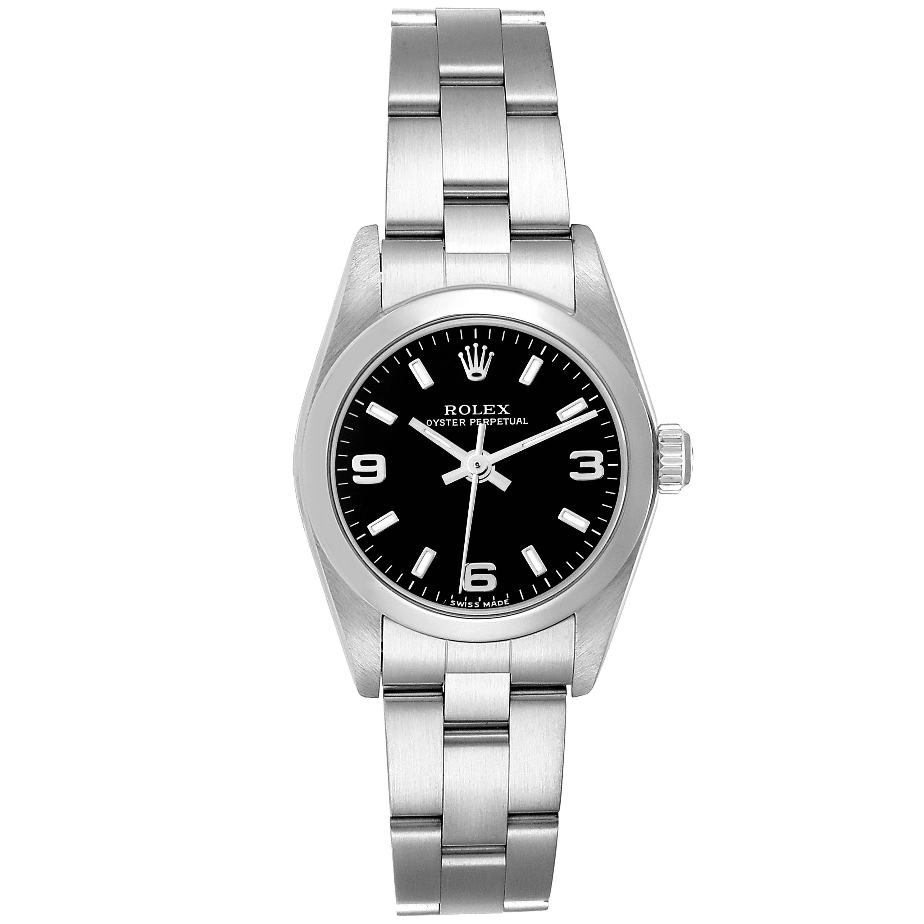 The Rolex Oyster Perpetual 76080 Women's Stainless Steel Black Dial 76080 Women's Stainless Steel Black Dial watch is shown from a frontal angle, showcasing its dial, bezel, and bracelet.
