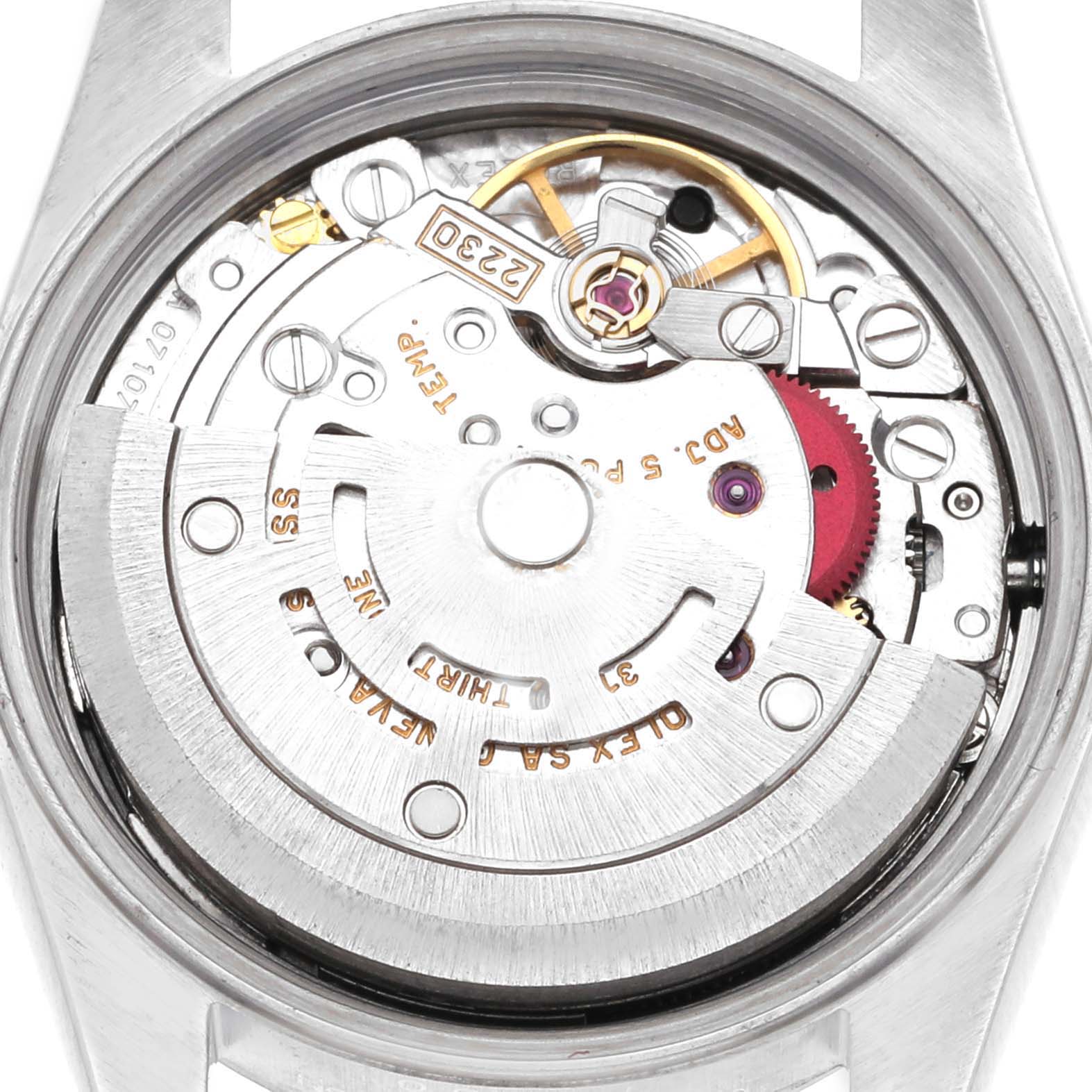 The image shows the movement from the back of the Rolex Oyster Perpetual 76080 Women's Stainless Steel Black Dial 76080 Women's Stainless Steel Black Dial, including gears and the rotor.