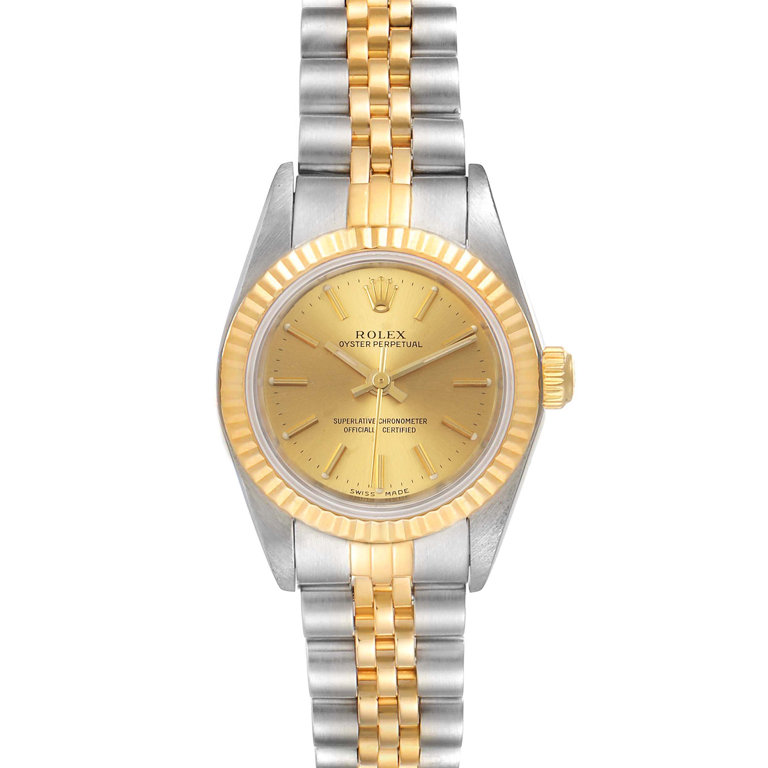 The image shows a frontal view of a Rolex Oyster Perpetual 76193 Women
s Steel and Gold (two tone) Champagne Dial 76193 Women
s Steel and Gold (two tone) Champagne Dial watch, highlighting the dial, bezel, and two-tone bracelet.