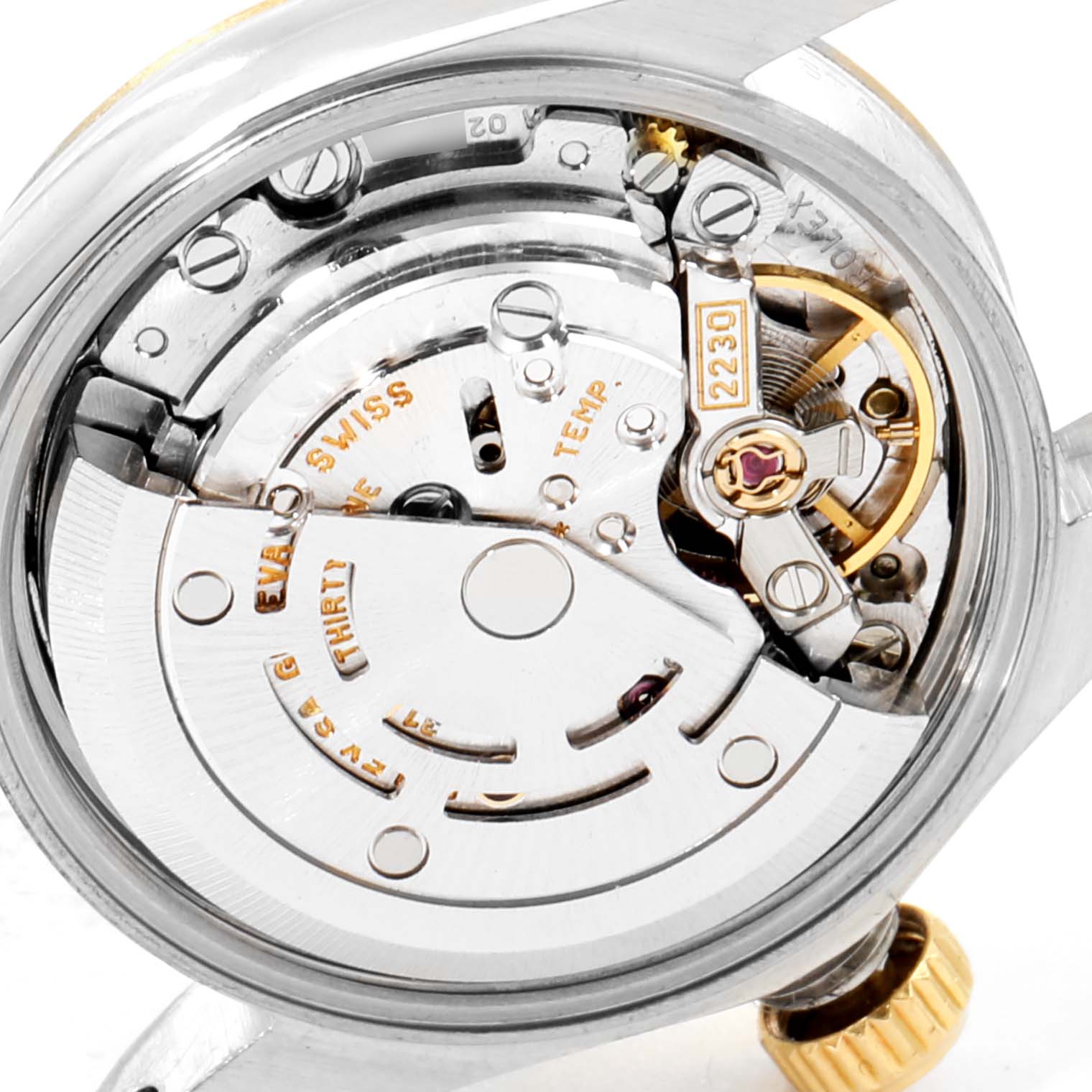 The image shows the movement mechanism inside the Rolex Oyster Perpetual 76193 Women
s Steel and Gold (two tone) Champagne Dial 76193 Women
s Steel and Gold (two tone) Champagne Dial watch, viewed from the back.