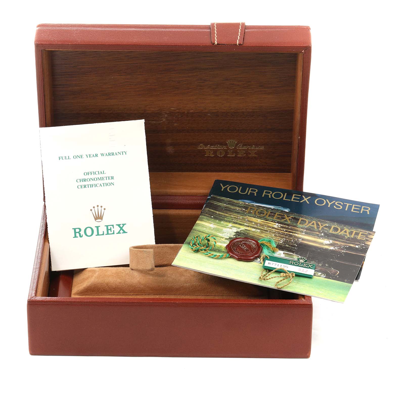 This image shows an open Rolex box with warranty booklets and tags for the Rolex President 18238 Men's Yellow Gold Black Dial 18238 Men's Yellow Gold Black Dial model.