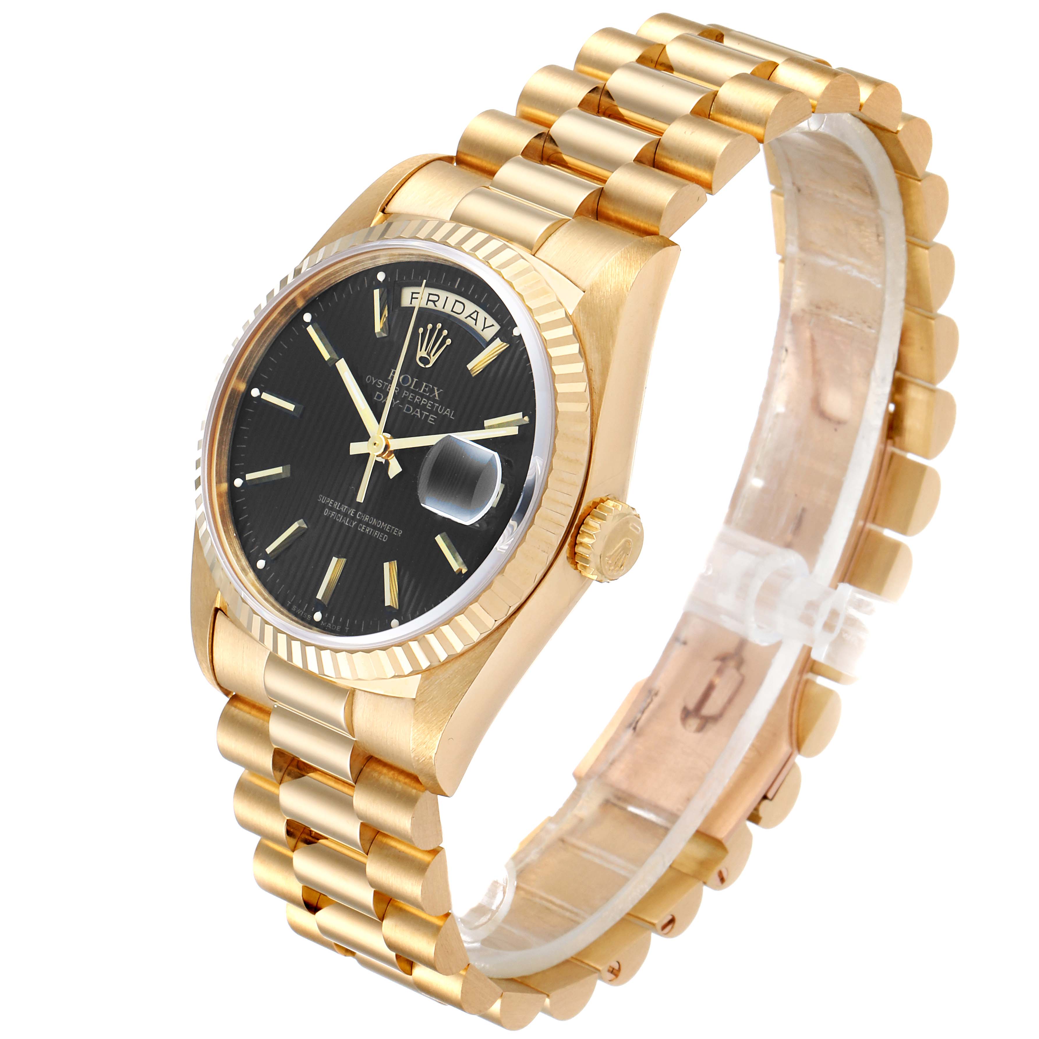 The image shows a President model Rolex watch from an angled side view, highlighting the gold band, black dial, and fluted bezel.