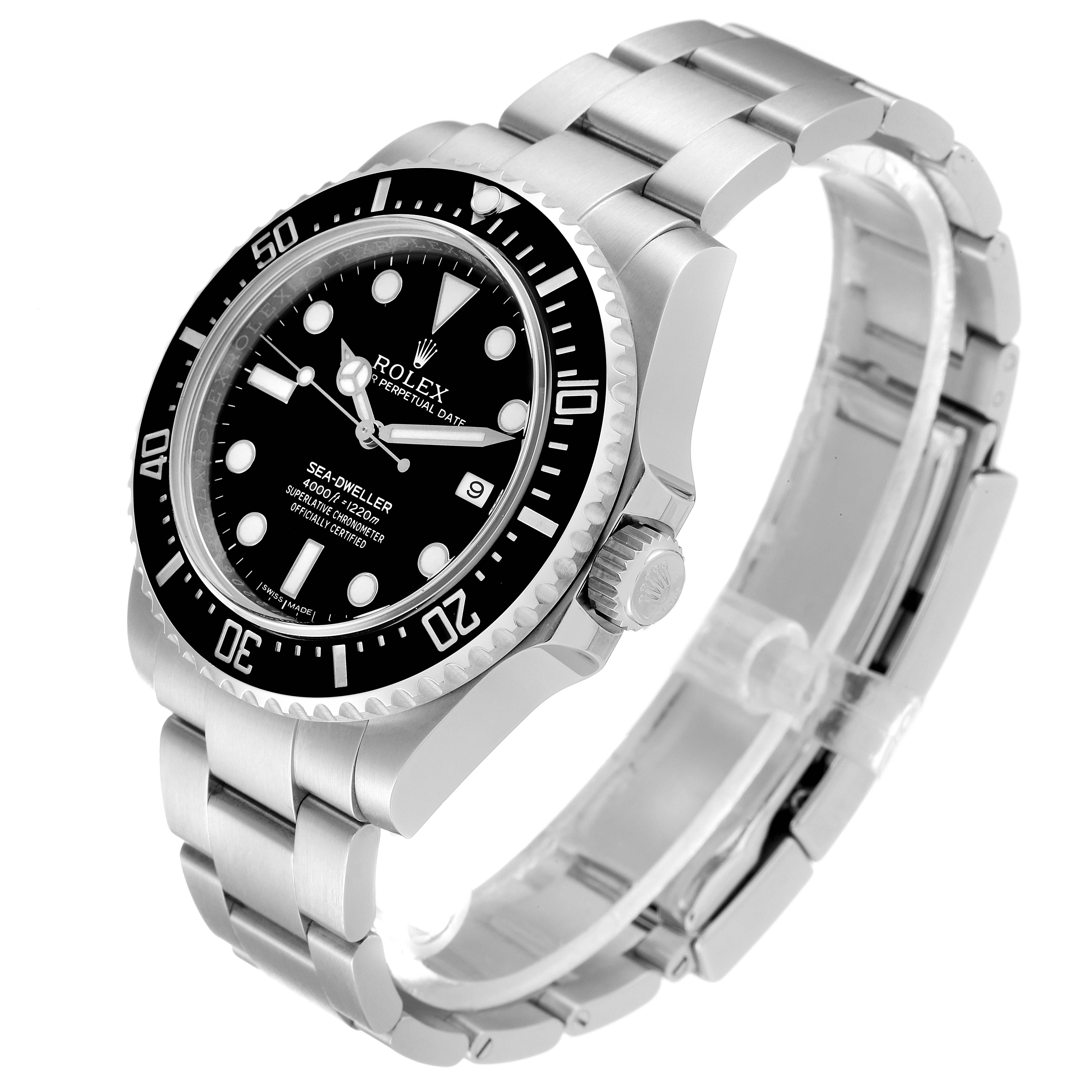 The image shows a Rolex Sea-Dweller 116600 Men
s Stainless Steel Black Dial 116600 Men
s Stainless Steel Black Dial watch from an angled side view, highlighting its face, bezel, crown, and bracelet.
