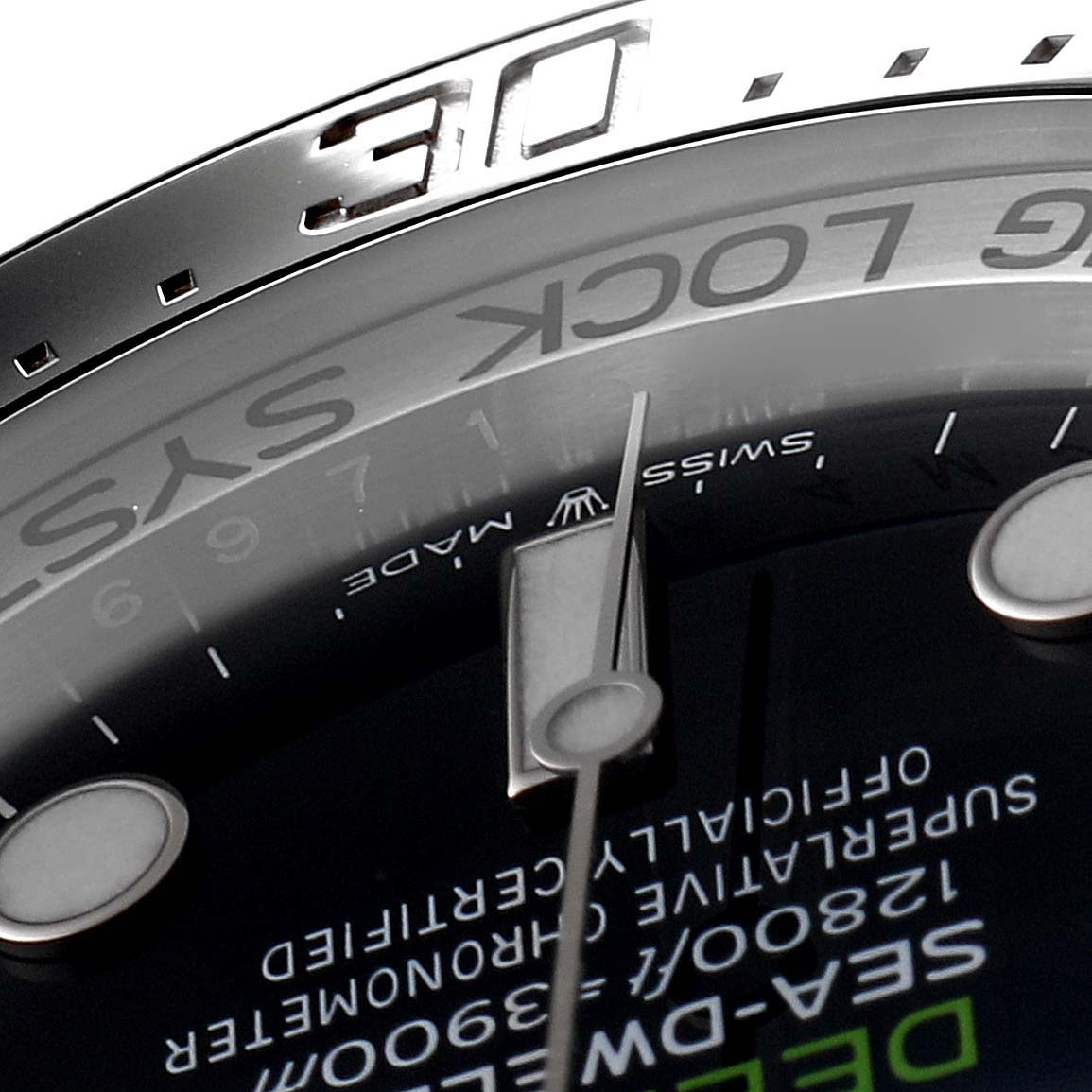 The image shows a close-up angle of the dial, hands, and part of the bezel with text from the Rolex Sea-Dweller 126660 Men
s Stainless Steel Blue Dial 126660 Men
s Stainless Steel Blue Dial watch.