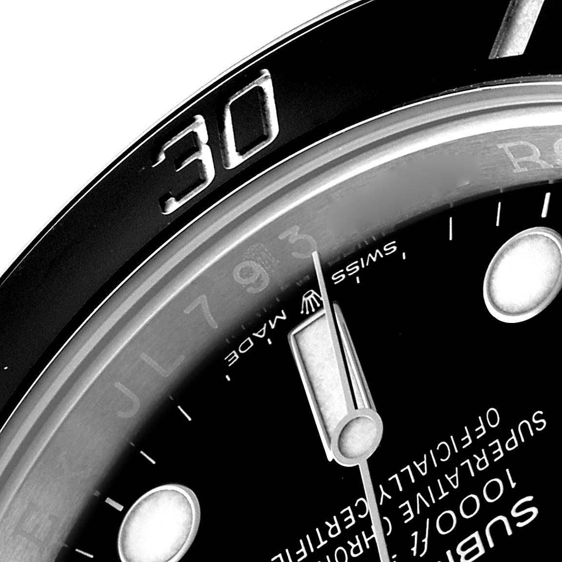 This close-up angle of a Rolex Submariner 126610 Men's Stainless Steel Black Dial 126610 Men's Stainless Steel Black Dial watch shows part of the bezel, dial, and hands.