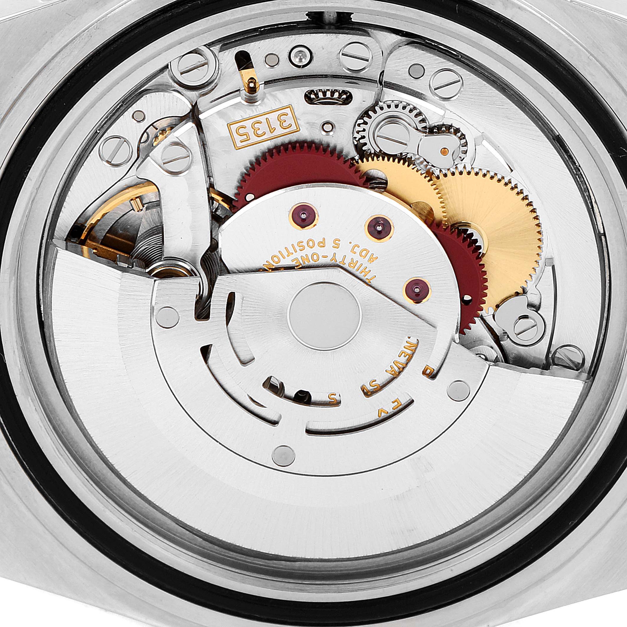 This image shows the inner mechanics and movement of the Rolex Submariner 16613 Men
s Steel and Gold (two tone) Grey Dial 16613 Men
s Steel and Gold (two tone) Grey Dial watch from a rear angle.