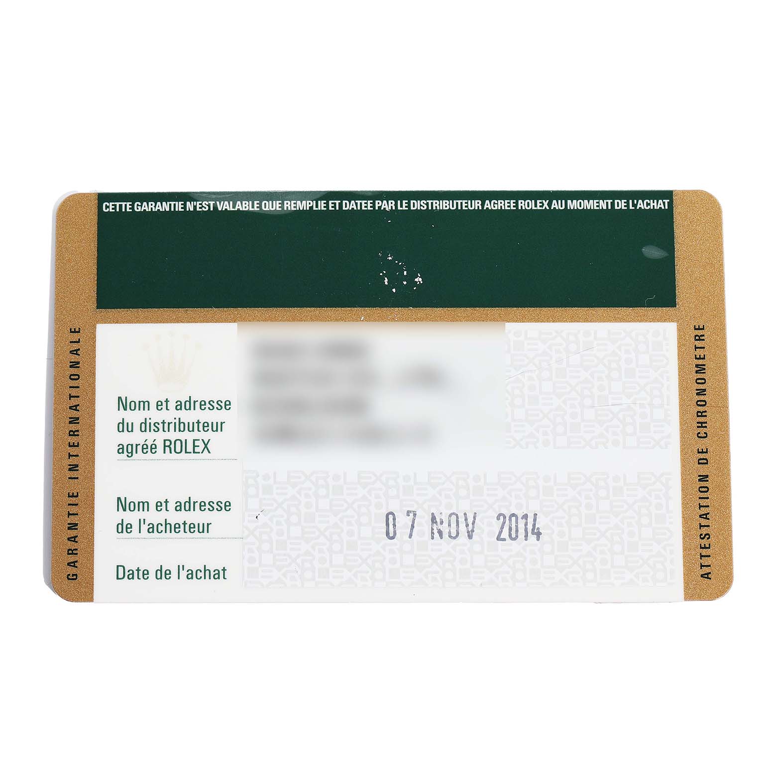 This image shows a guarantee card for a Rolex Submariner 116613 Men's Stainless Steel Black Dial watch, featuring the brand's logo and purchase details.