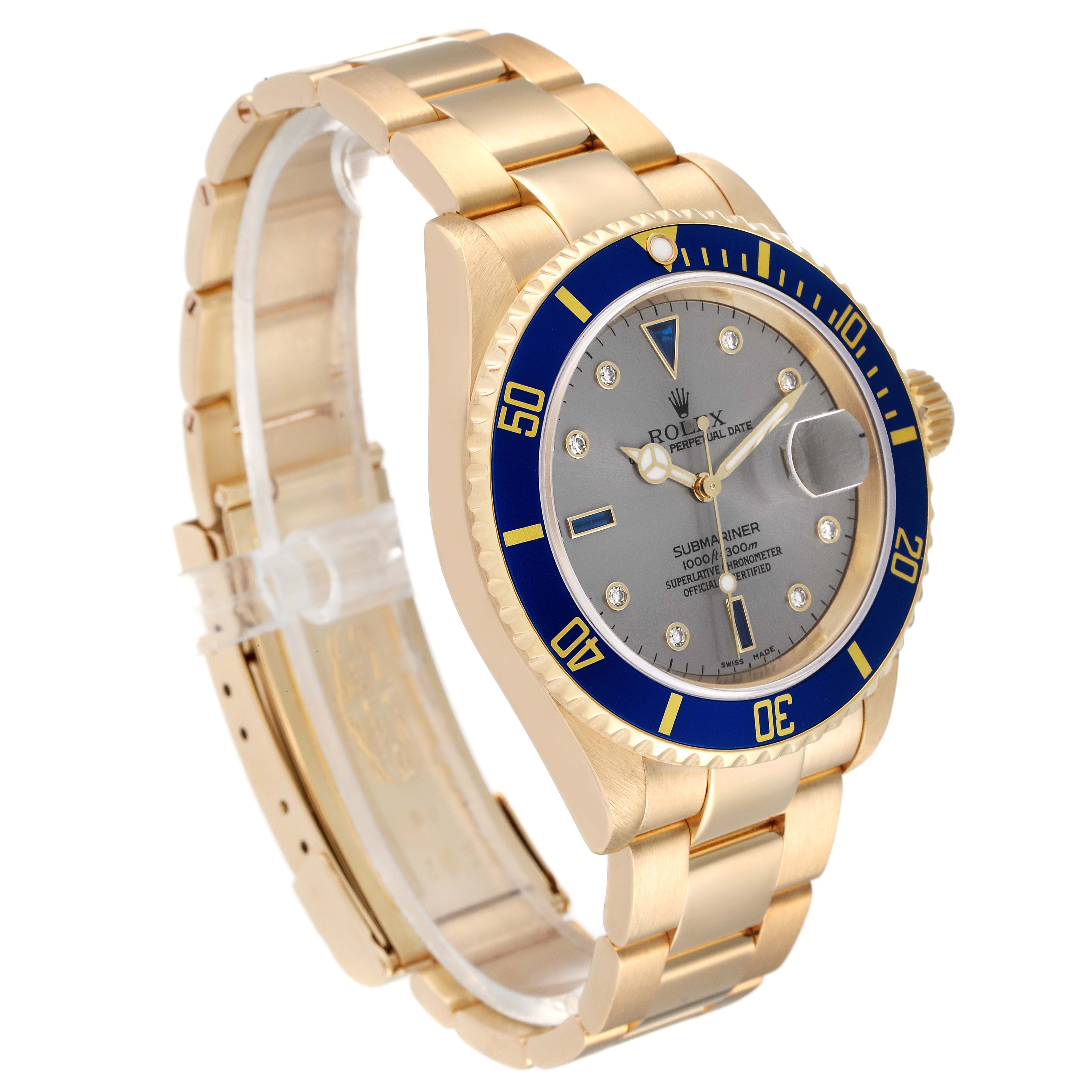 This image shows a side and front angle of the Rolex Submariner 16618 Men's Yellow Gold Grey Dial 16618 Men's Yellow Gold Grey Dial watch, highlighting its gold strap and blue bezel.