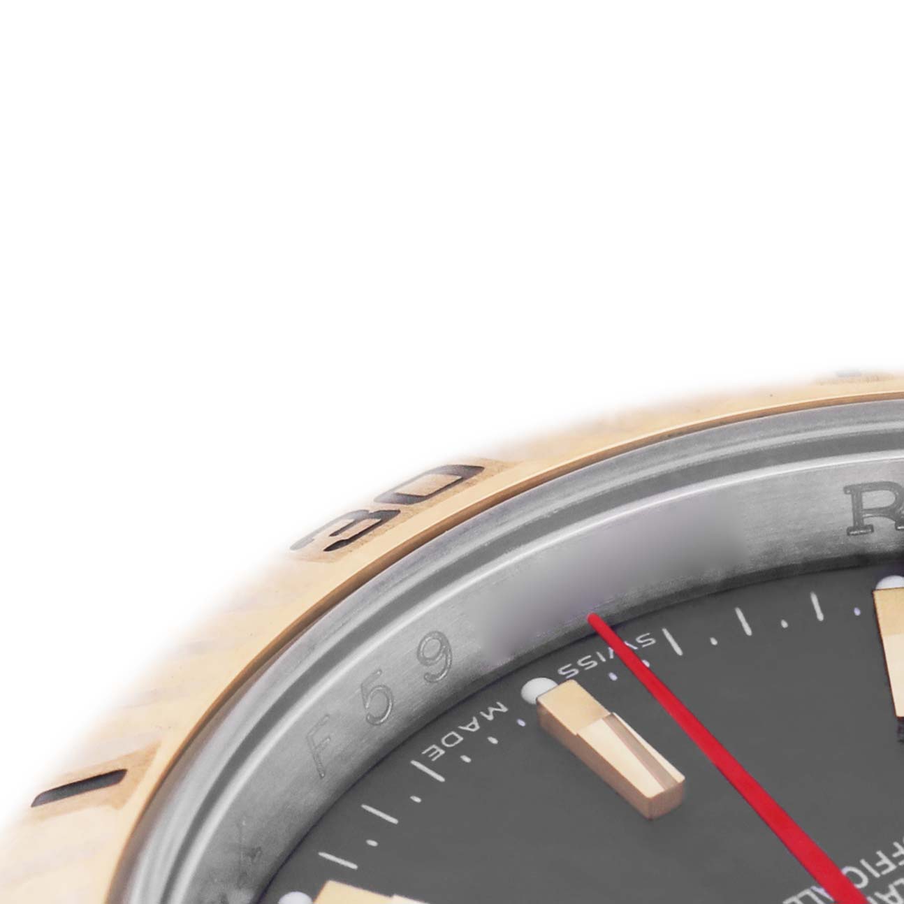 The image shows a close-up of the bezel and partly visible dial of a Rolex Turn-o-Graph 116263 Men's Steel and Gold (two tone) Grey Dial watch, highlighting the indices and minute markers.