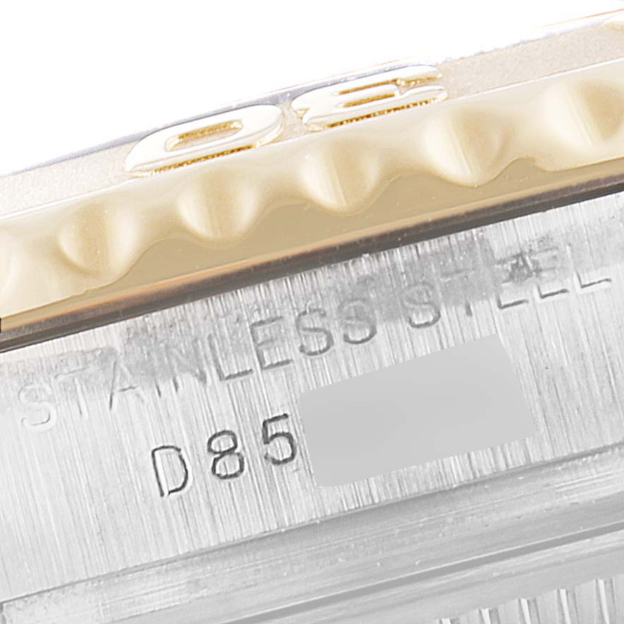 The image shows a close-up angle of the bezel and engravings on the side of a Rolex Yacht-Master 169623 Women's Steel and Gold (two tone) Mother of Pearl Dial 169623 Women's Steel and Gold (two tone) Mother of Pearl Dial watch.