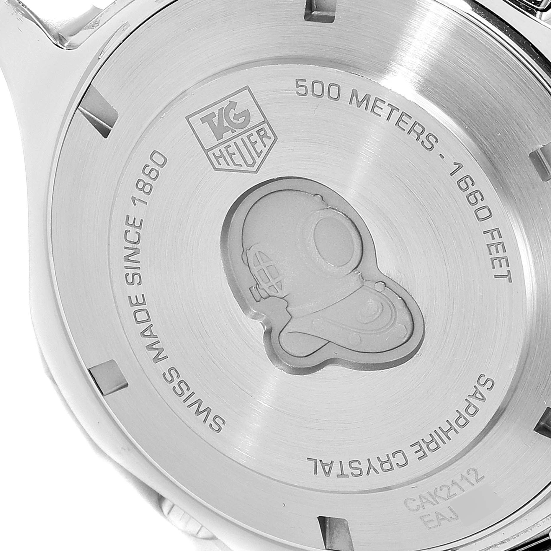 The image shows the back case of a Tag Heuer Aquaracer CAK2112.BA0833 Men's Stainless Steel Blue Dial CAK2112.BA0833 Men's Stainless Steel Blue Dial watch, featuring engravings and a divers helmet logo.