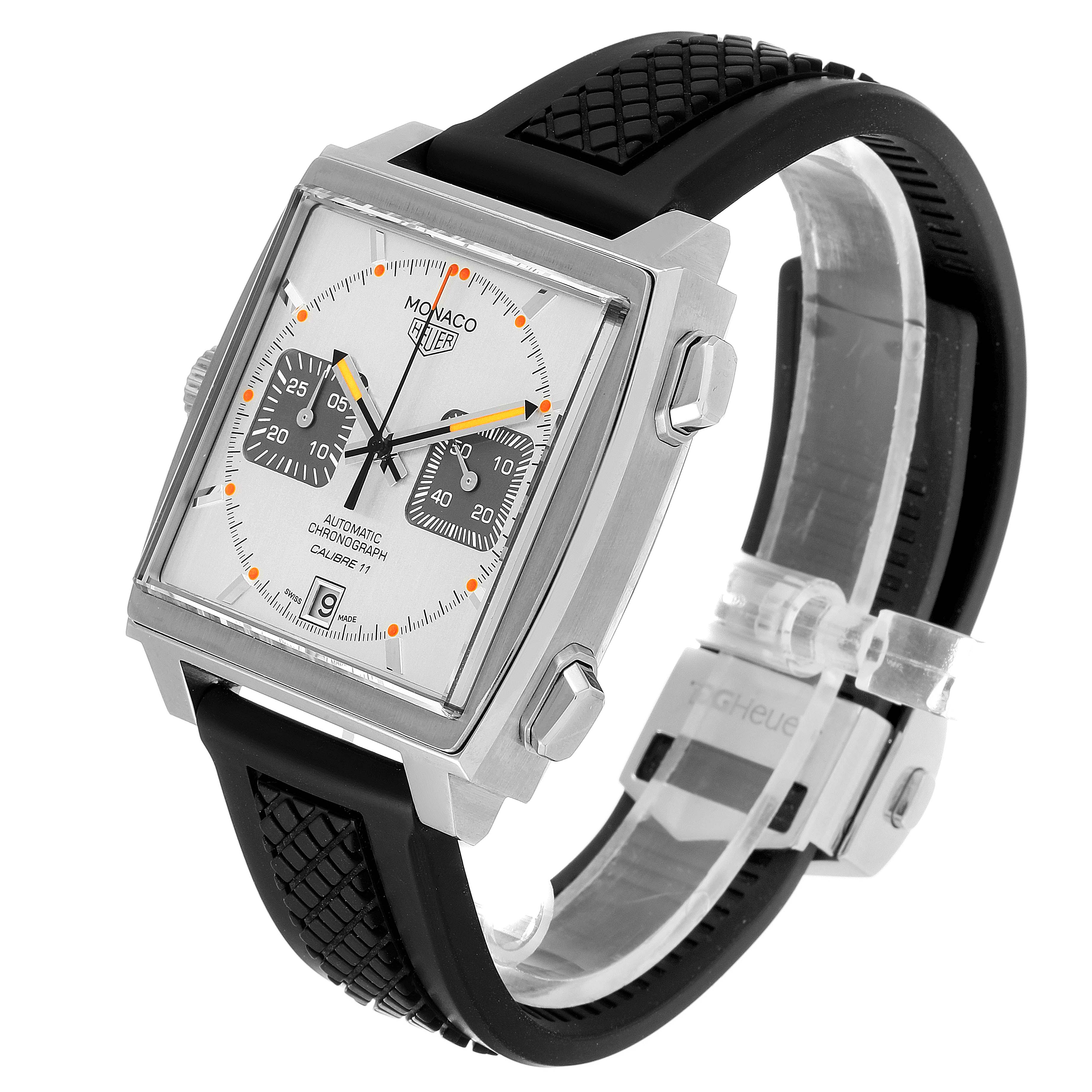 This Tag Heuer Monaco watch is shown at an angle highlighting the face, strap, and side crown.