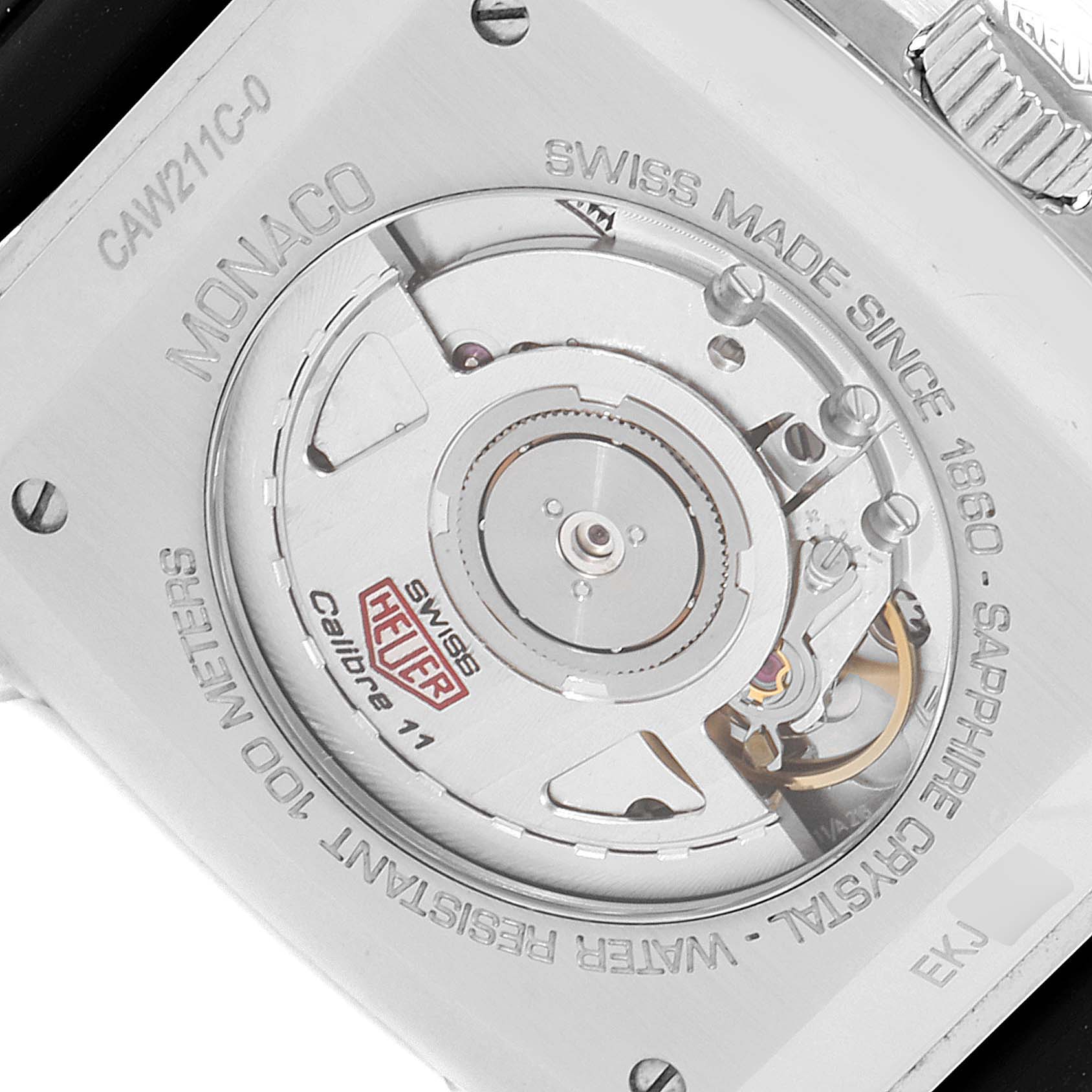 This image shows the back view of a Tag Heuer Monaco watch, highlighting its internal movement and specifications.
