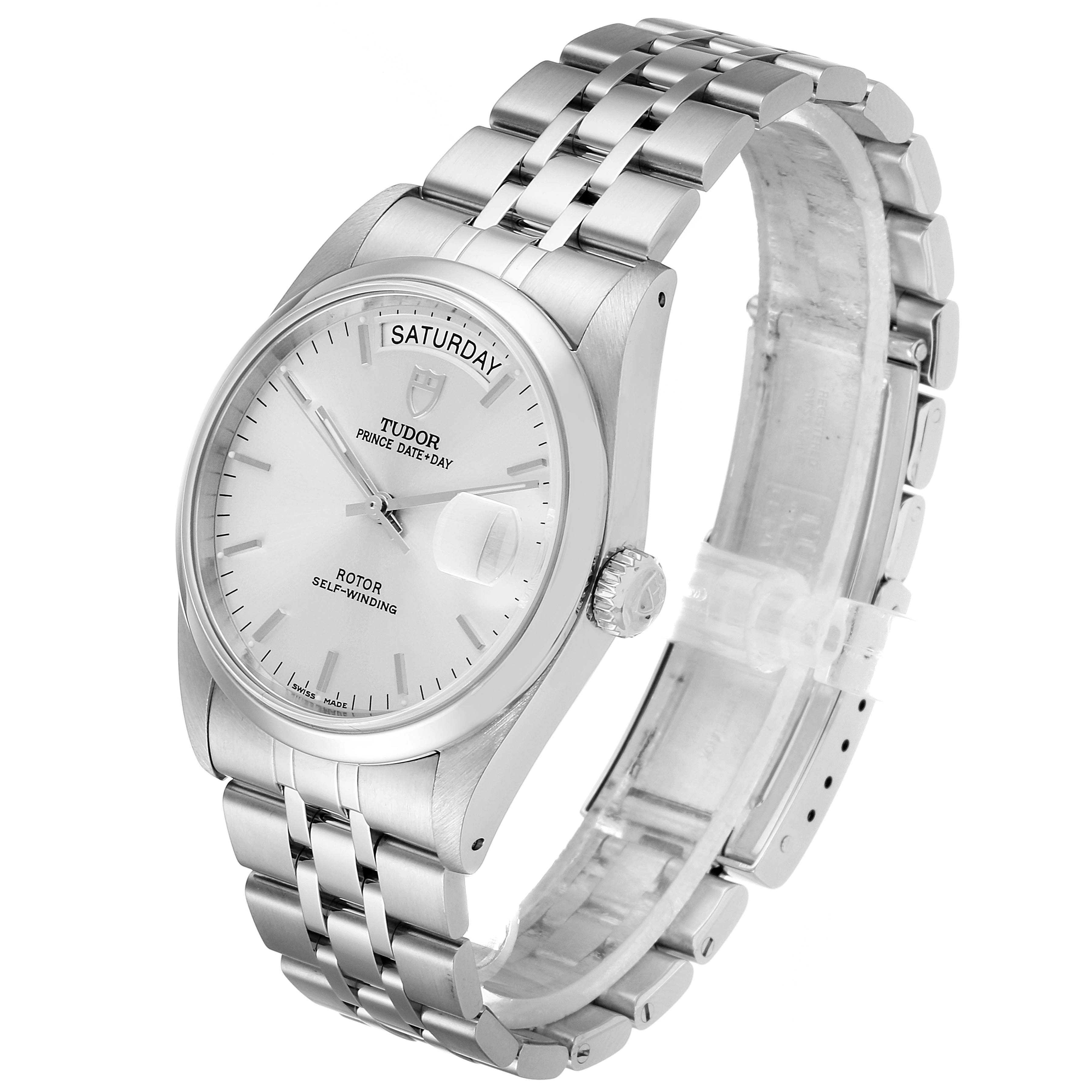 The image shows a Tudor Prince 76200 Men
s Stainless Steel Silver Dial 76200 Men
s Stainless Steel Silver Dial model watch from an oblique angle, highlighting the dial, bezel, crown, and bracelet.