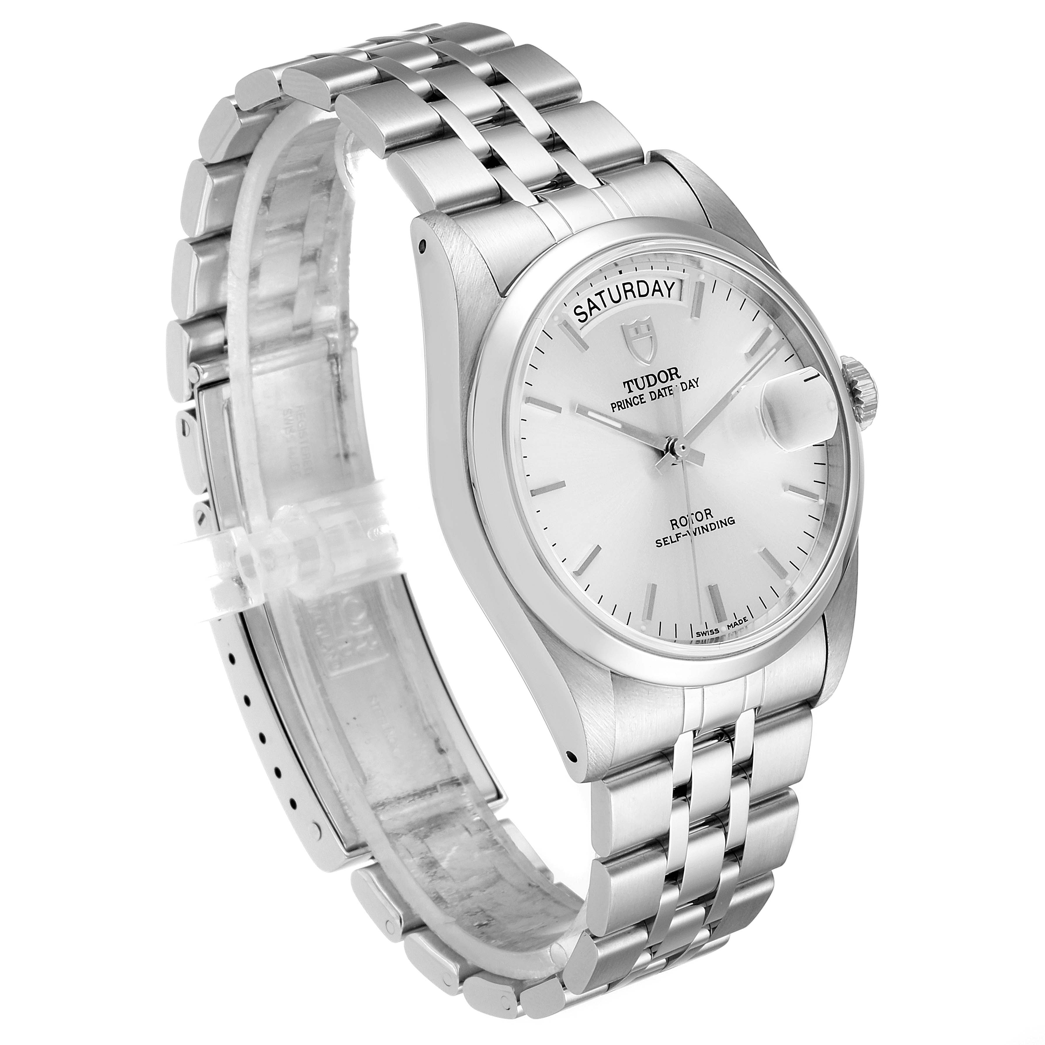 The image shows a Tudor Prince 76200 Men
s Stainless Steel Silver Dial 76200 Men
s Stainless Steel Silver Dial watch at an angle highlighting the watch face, bracelet, and crown.