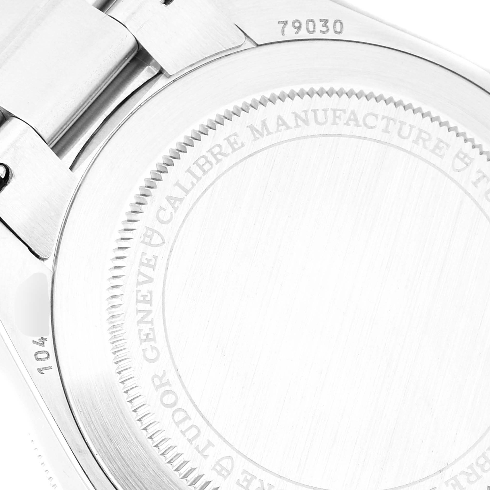 The image shows the case back and part of the bracelet of a Tudor Heritage Black Bay 79030B Men
s Stainless Steel Blue Dial 79030B Men
s Stainless Steel Blue Dial watch, model 79030.