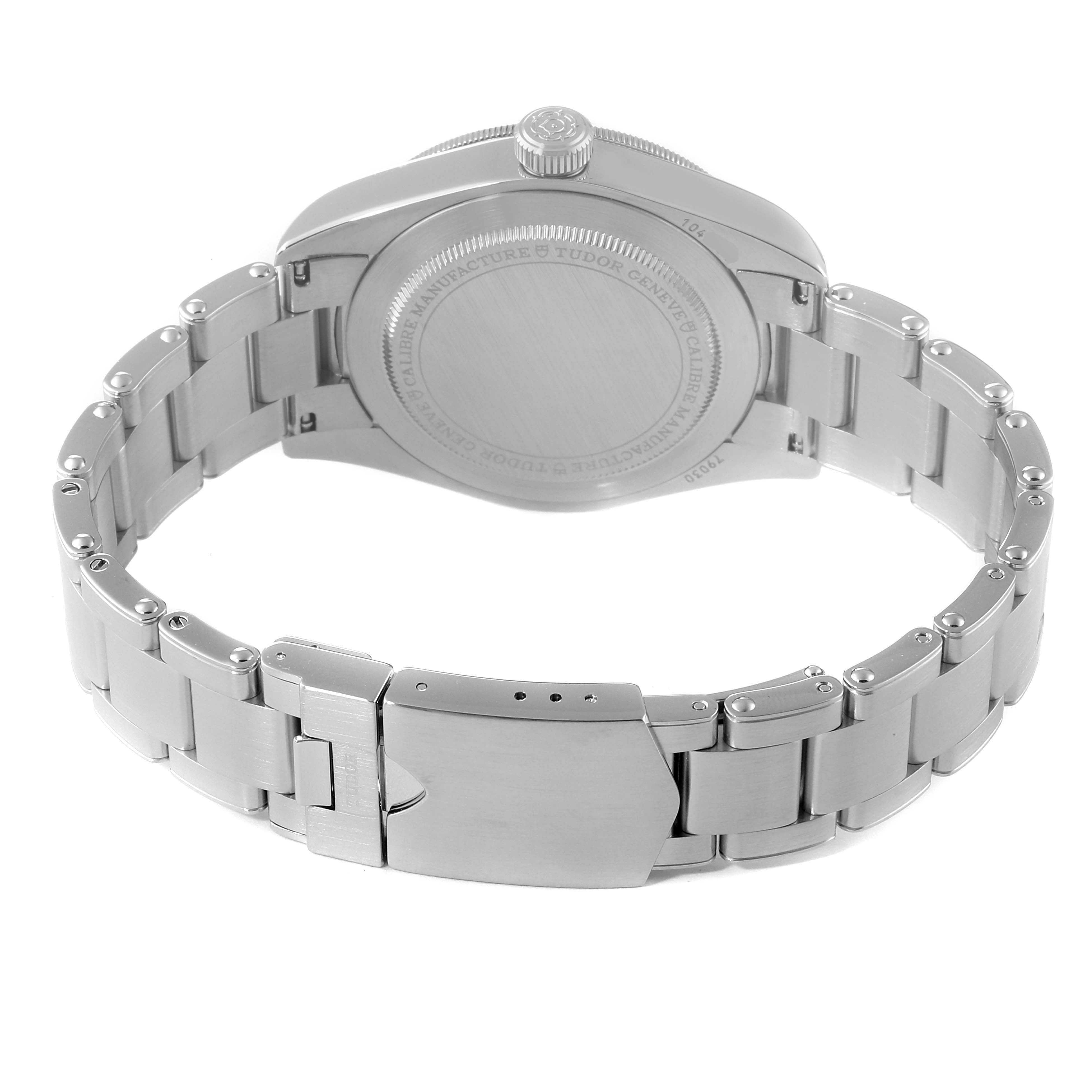 The image shows the back view of the Tudor Heritage Black Bay 79030B Men
s Stainless Steel Blue Dial 79030B Men
s Stainless Steel Blue Dial watch, highlighting its stainless steel case and bracelet.