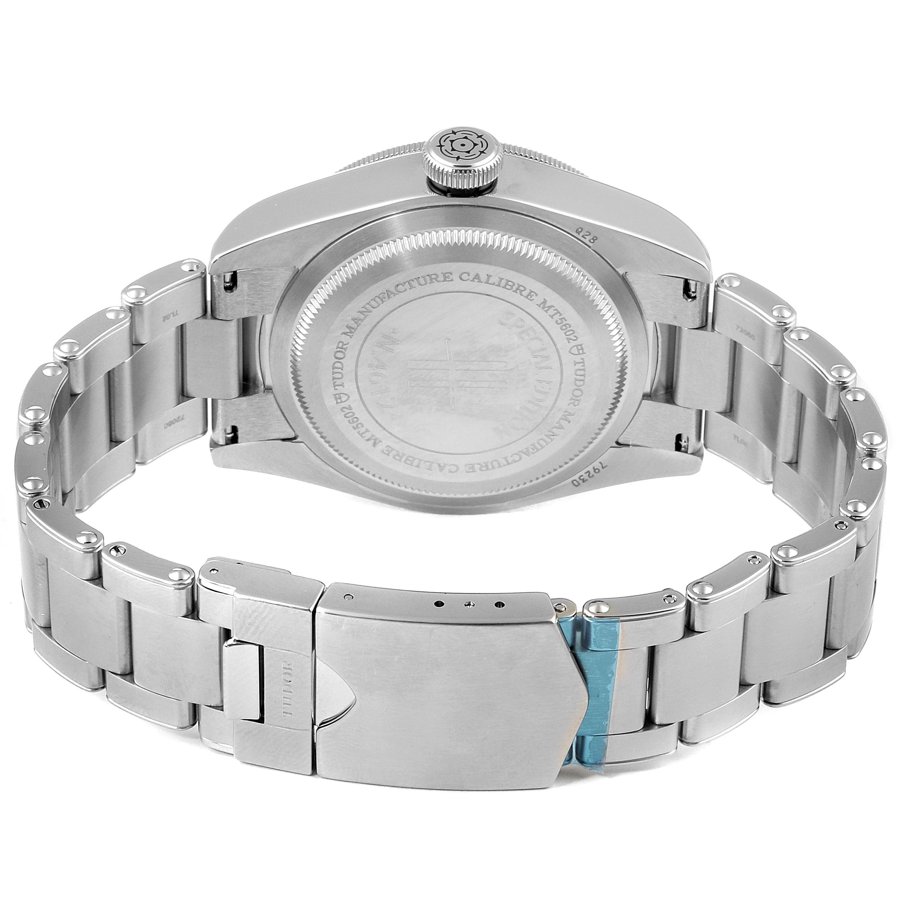 The image shows the back view of a Tudor Heritage Black Bay 79230G Men's Stainless Steel Black Dial 79230G Men's Stainless Steel Black Dial watch, highlighting its stainless steel case back and bracelet clasp.