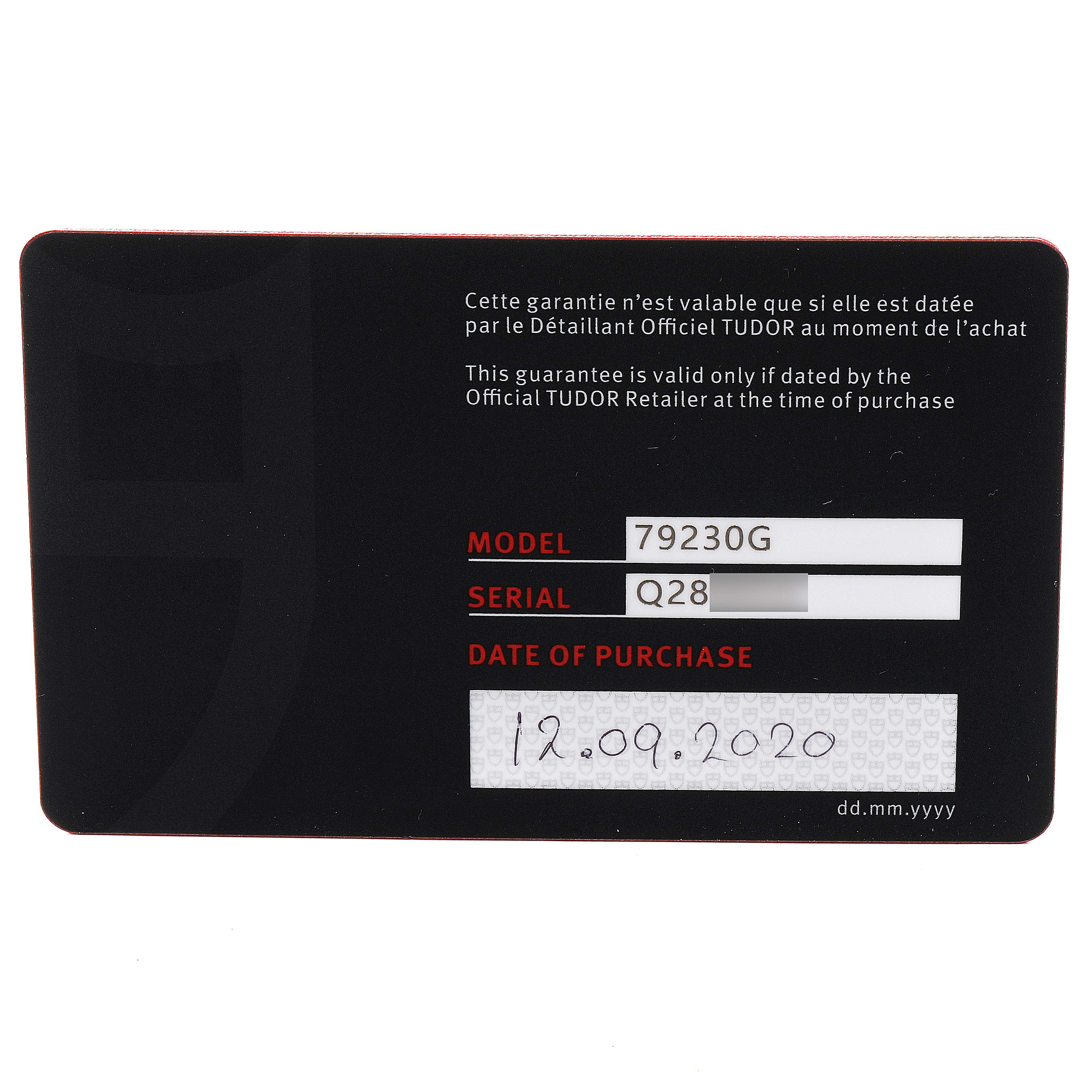 This image shows a guarantee card for the Tudor Heritage Black Bay 79230G Men's Stainless Steel Black Dial 79230G Men's Stainless Steel Black Dial model 79230G, including the serial number and date of purchase.