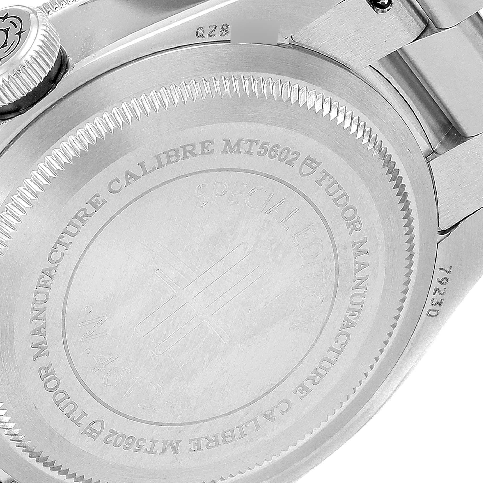 The image shows the back case and part of the bracelet of a Tudor Heritage Black Bay 79230G Men's Stainless Steel Black Dial 79230G Men's Stainless Steel Black Dial watch.