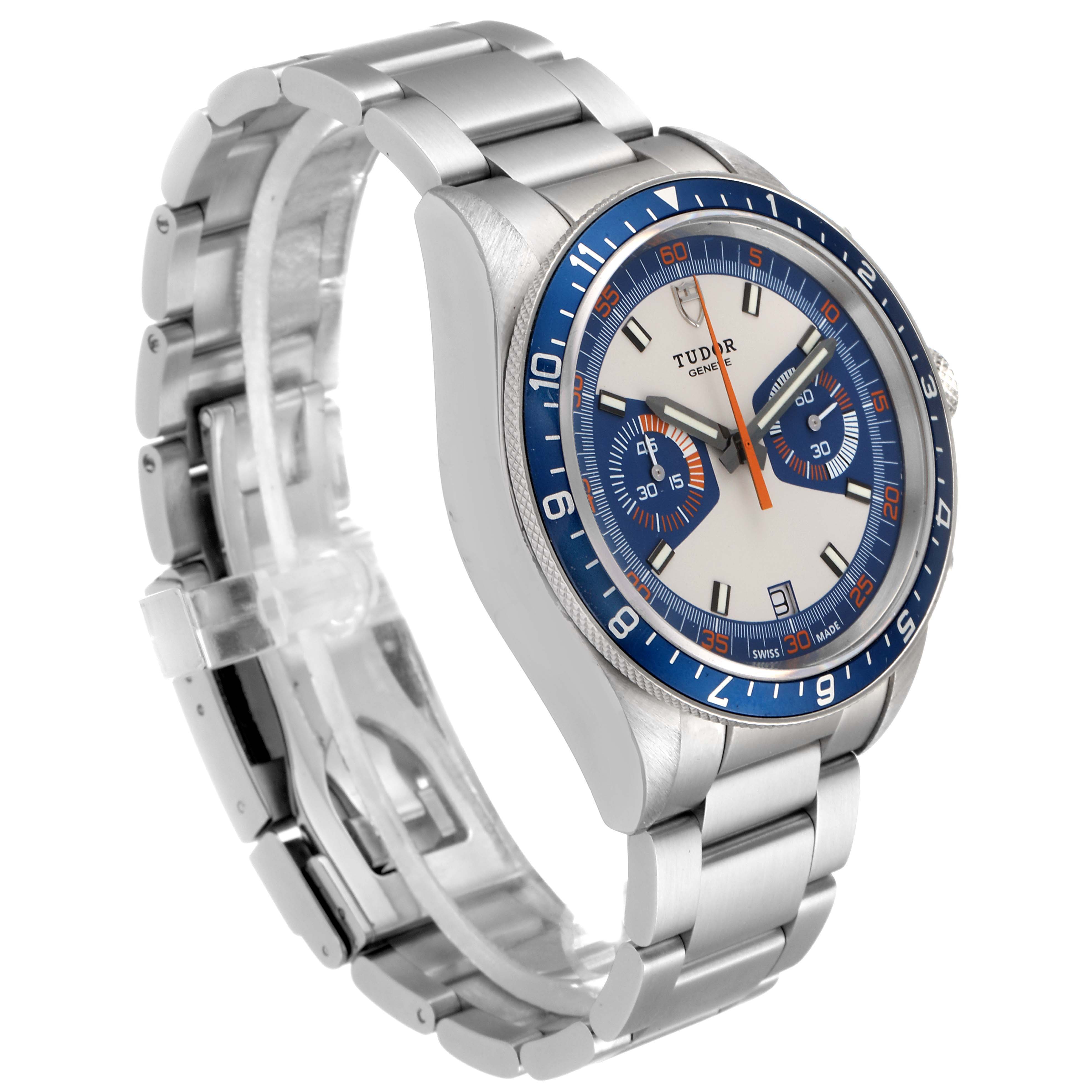 The Tudor Heritage Chrono 70330B Men's Stainless Steel Blue Dial 70330B Men's Stainless Steel Blue Dial watch is shown at a slight angle, displaying the face, bezel, and metal bracelet.