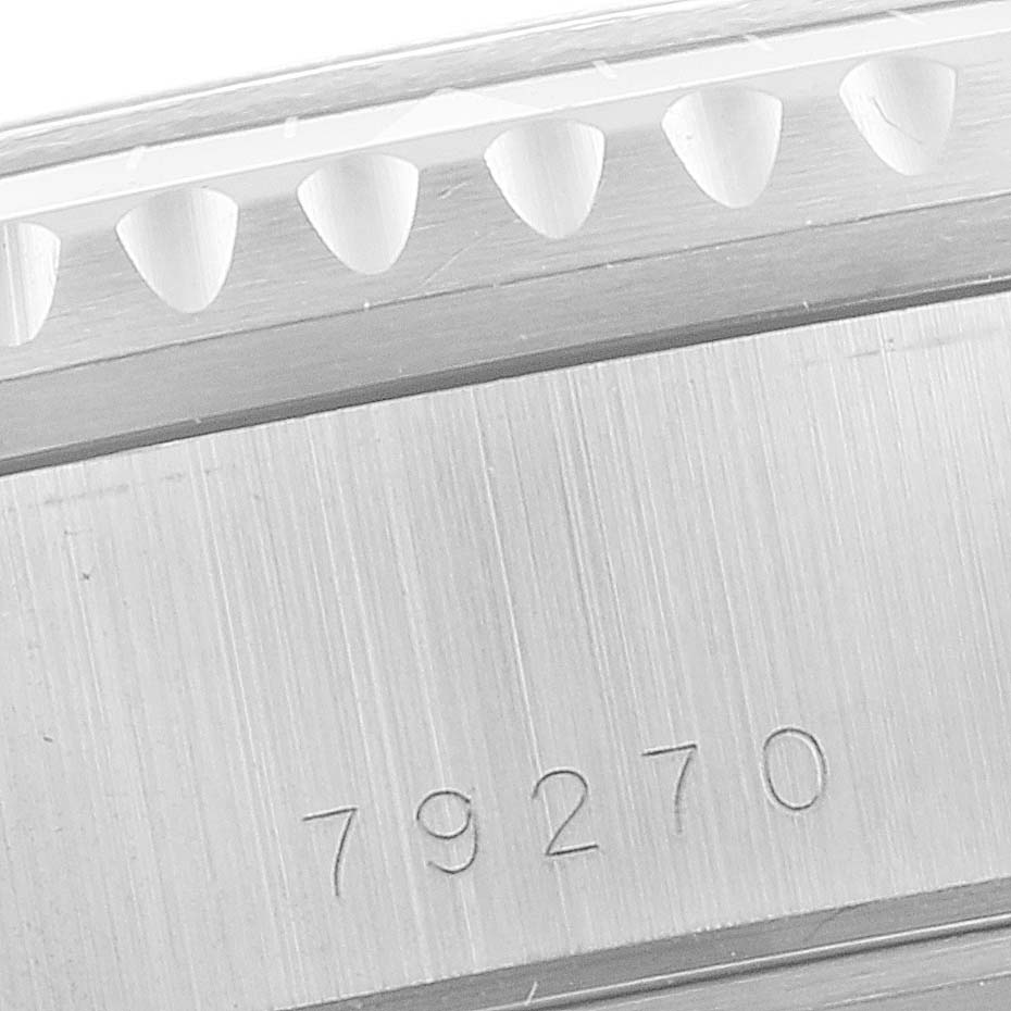 The image shows a close-up of the bezel and case side of a Tudor Tiger 79270 Men's Stainless Steel Burgundy Dial 79270 Men's Stainless Steel Burgundy Dial model watch with the engraving "79270."