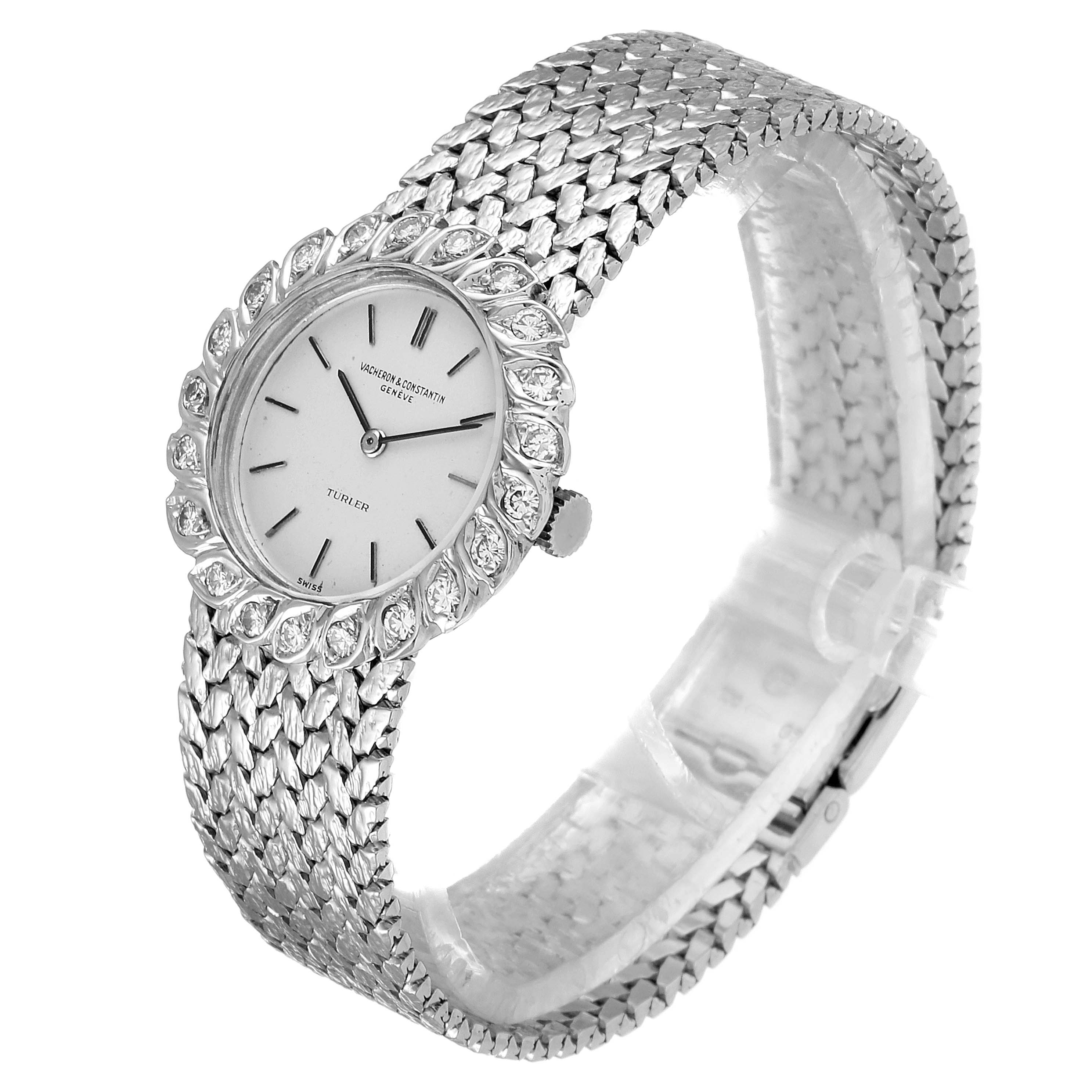 The image shows a Vintage Vacheron Constantin watch from an angled side view, displaying its detailed face, textured band, and bezel.