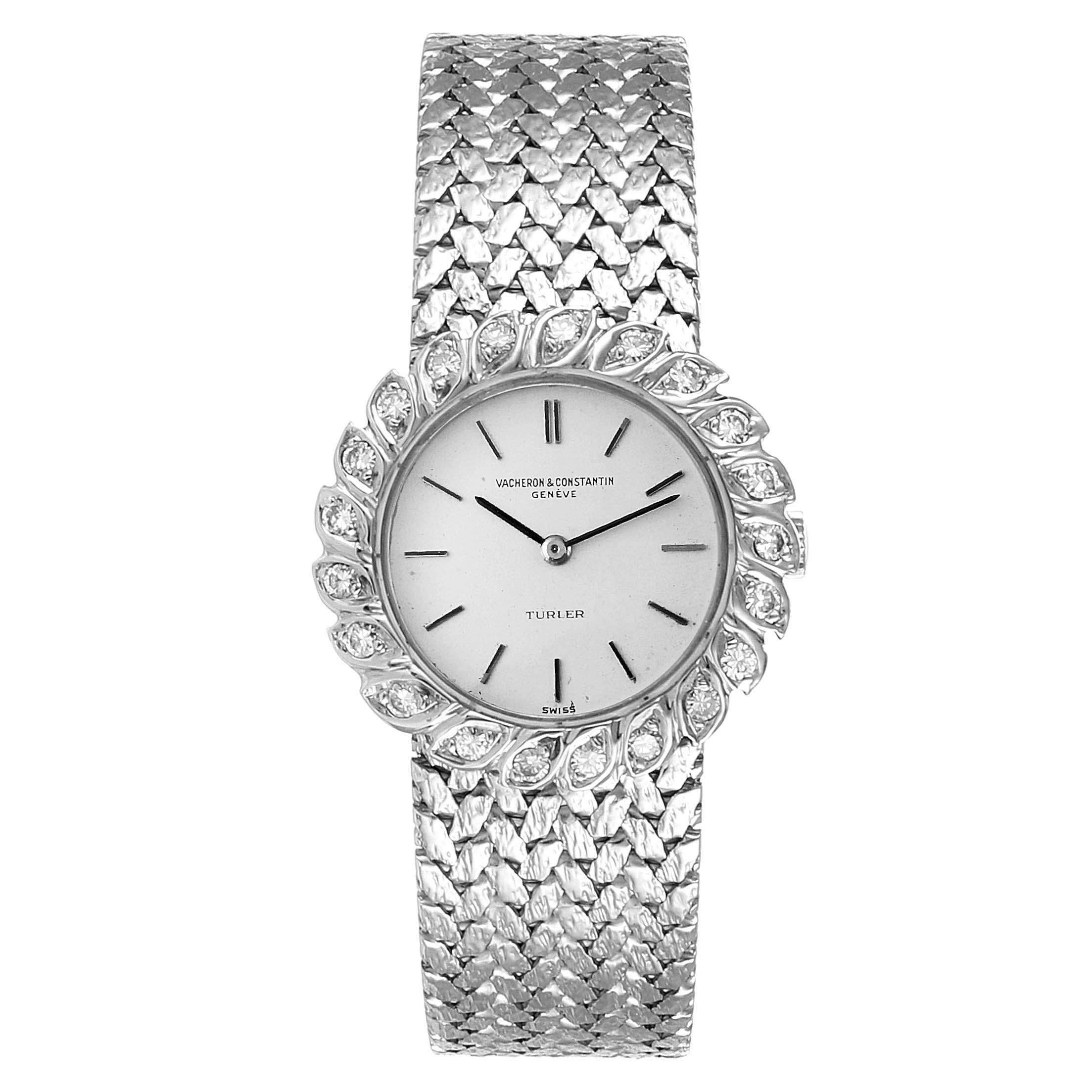 This image shows a front view of a Vintage Vacheron Constantin watch, highlighting its round dial, intricate bezel, and textured strap.