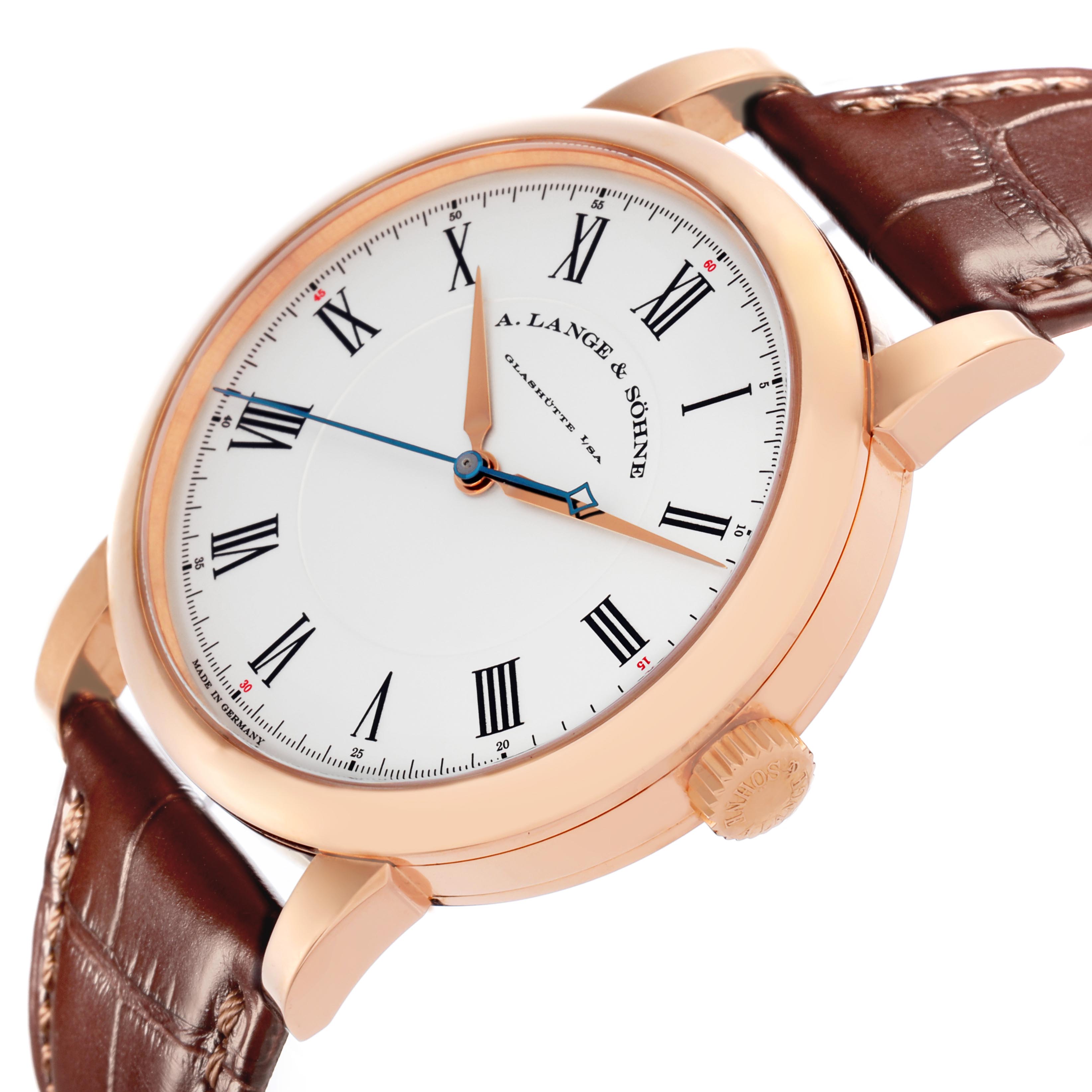 The Richard Lange watch by A. Lange & Söhne is shown at an angled side view, highlighting the dial, crown, and leather strap.