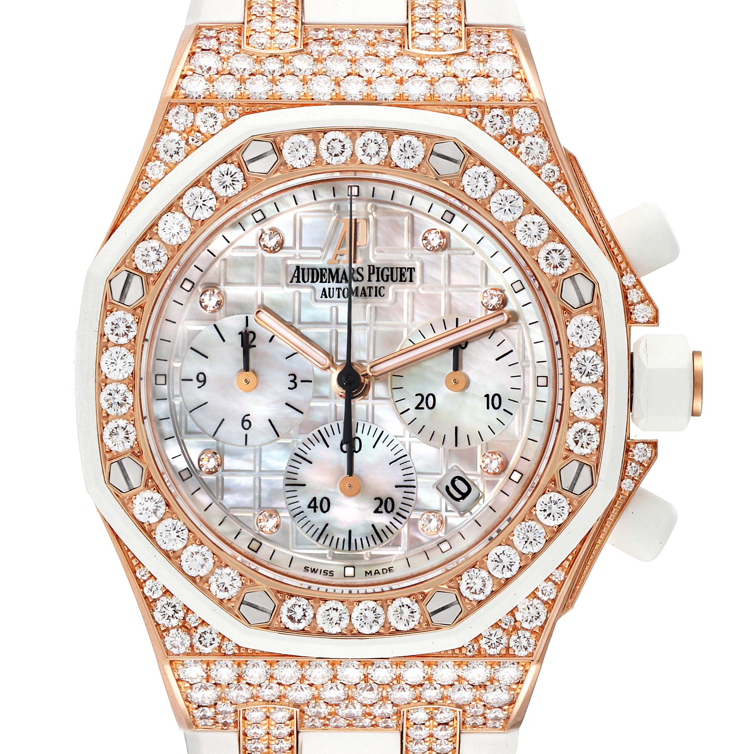 The image shows a front close-up view of an Audemars Piguet Royal Oak Offshore 26092OK.ZZ.D010CA.01 Women
s Rose Gold Mother of Pearl Dial 26092OK.ZZ.D010CA.01 Women
s Rose Gold Mother of Pearl Dial watch with a diamond-studded bezel and chronograph subdials.