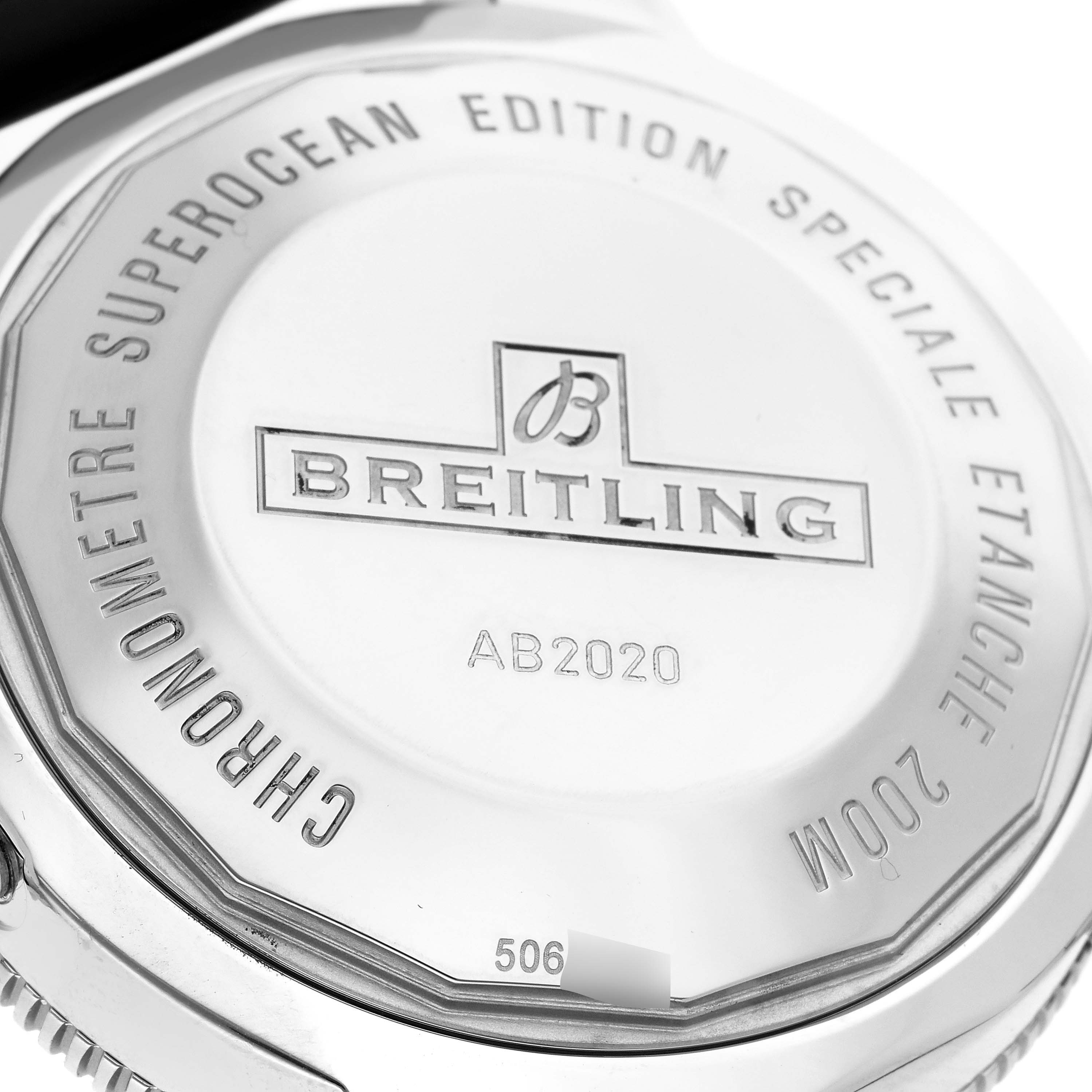 The image shows the back case of a Breitling Superocean AB202012-B1S1 Men's Stainless Steel Black Dial AB202012-B1S1 Men's Stainless Steel Black Dial watch, highlighting branding and engravings.