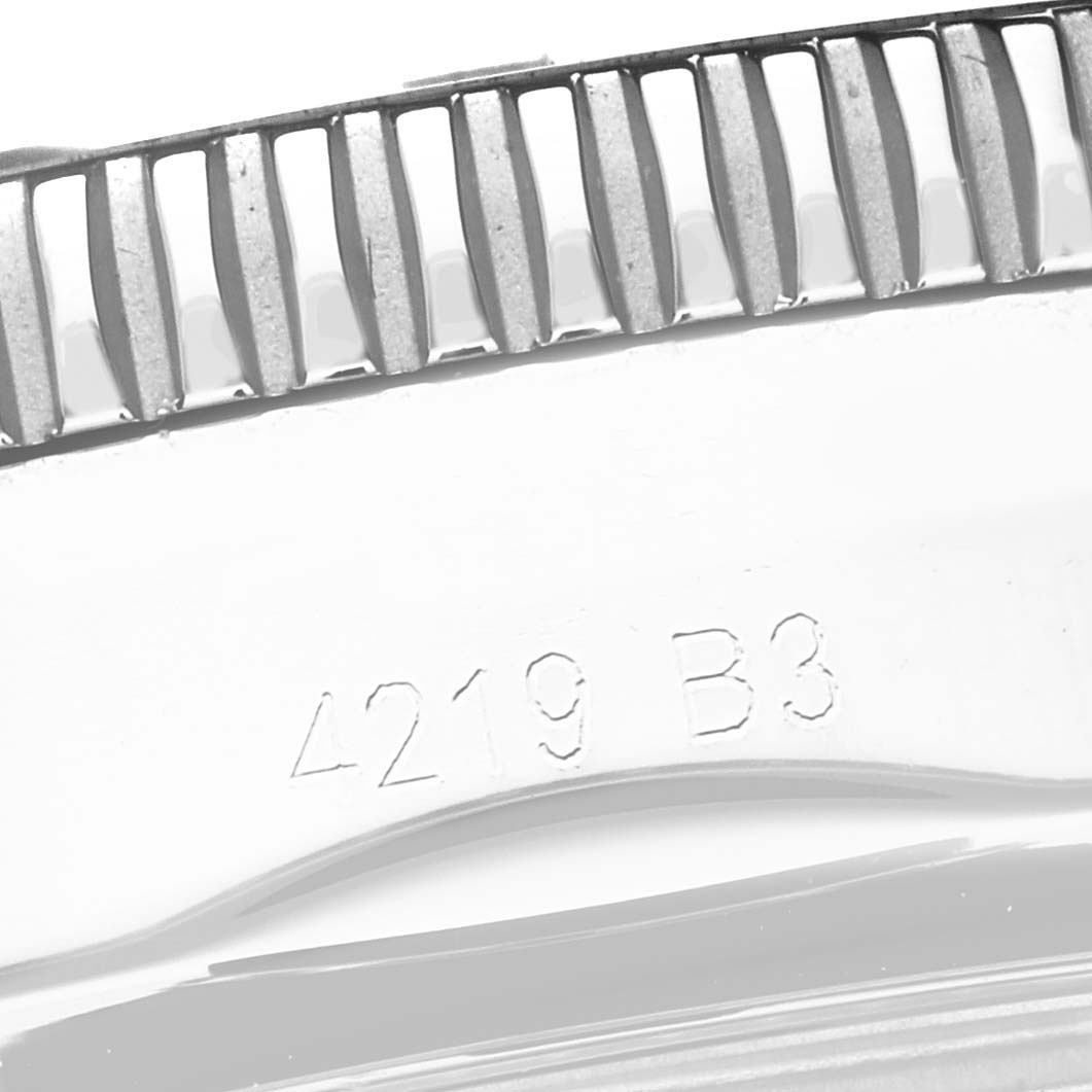 The image shows a close-up of the edge and part of the bezel with engravings of the Breitling Superocean AB202012-B1S1 Men's Stainless Steel Black Dial AB202012-B1S1 Men's Stainless Steel Black Dial watch.