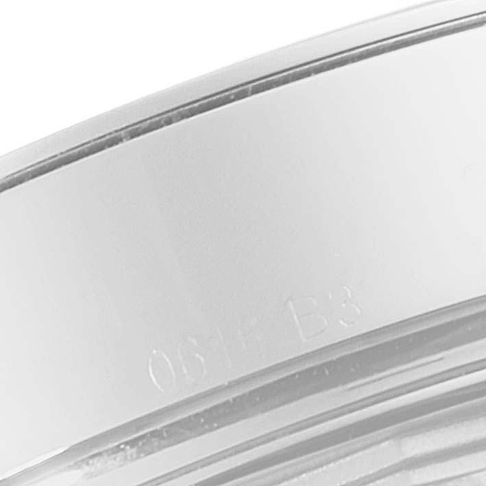 The image shows a close-up of the bezel or case side of a Breitling Transocean AB0510 Men's Stainless Steel Black Dial AB0510 Men's Stainless Steel Black Dial watch.