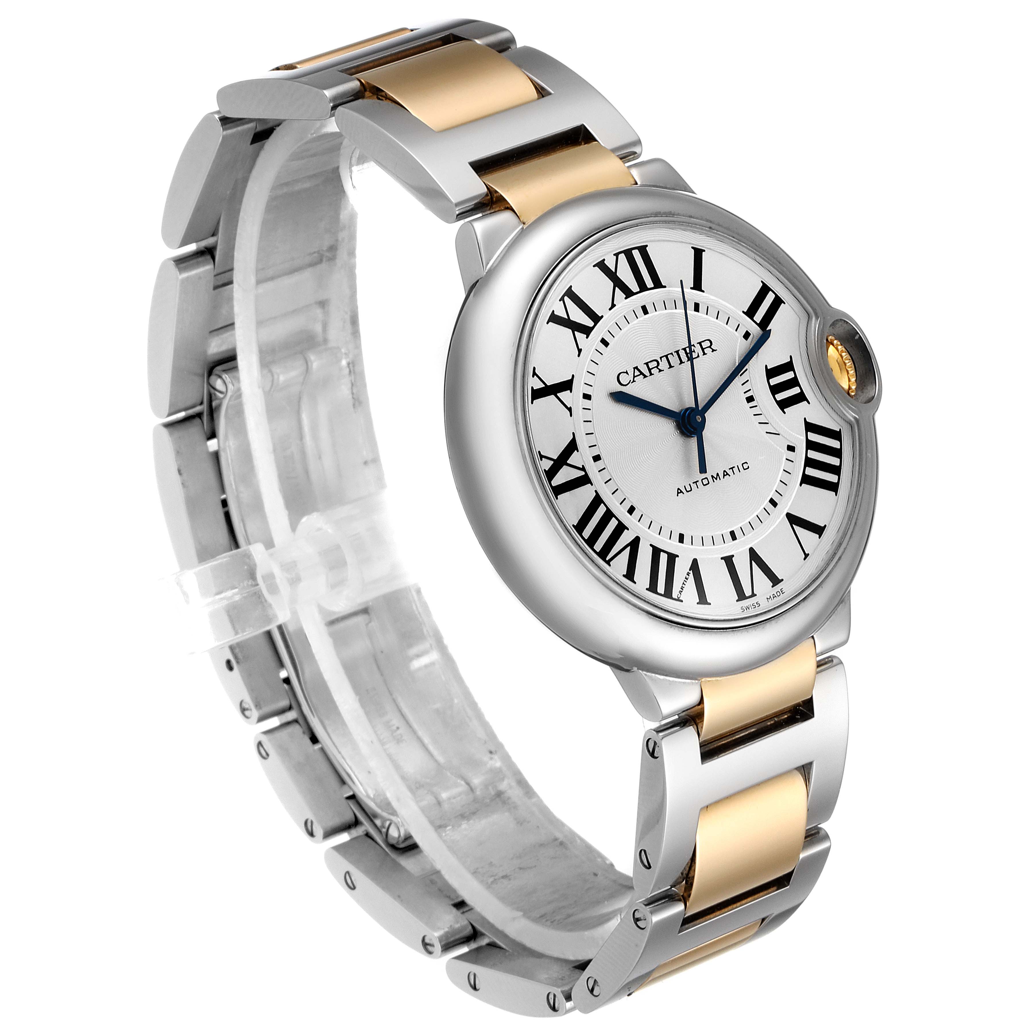 The image shows a Cartier Ballon Bleu W2BB0012 Women's Steel and Gold (two tone) Silver Dial W2BB0012 Women's Steel and Gold (two tone) Silver Dial model watch at an angle, highlighting its face, bracelet, and dual-tone design.