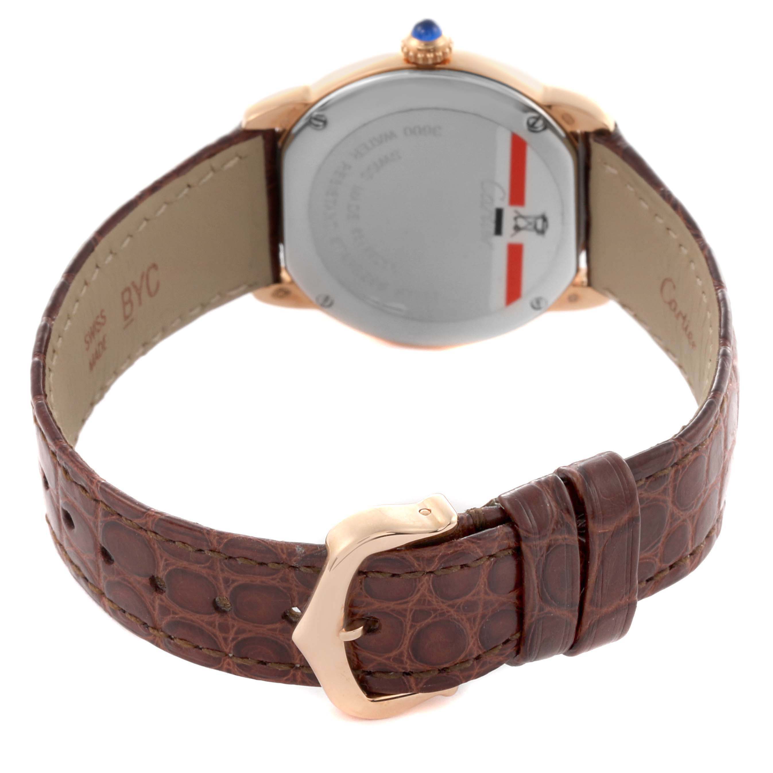 The image shows the back of the Cartier Ronde W6701007 Women's Steel and Gold (two tone) Silver Dial W6701007 Women's Steel and Gold (two tone) Silver Dial watch, highlighting the case back and brown leather strap with a buckle.