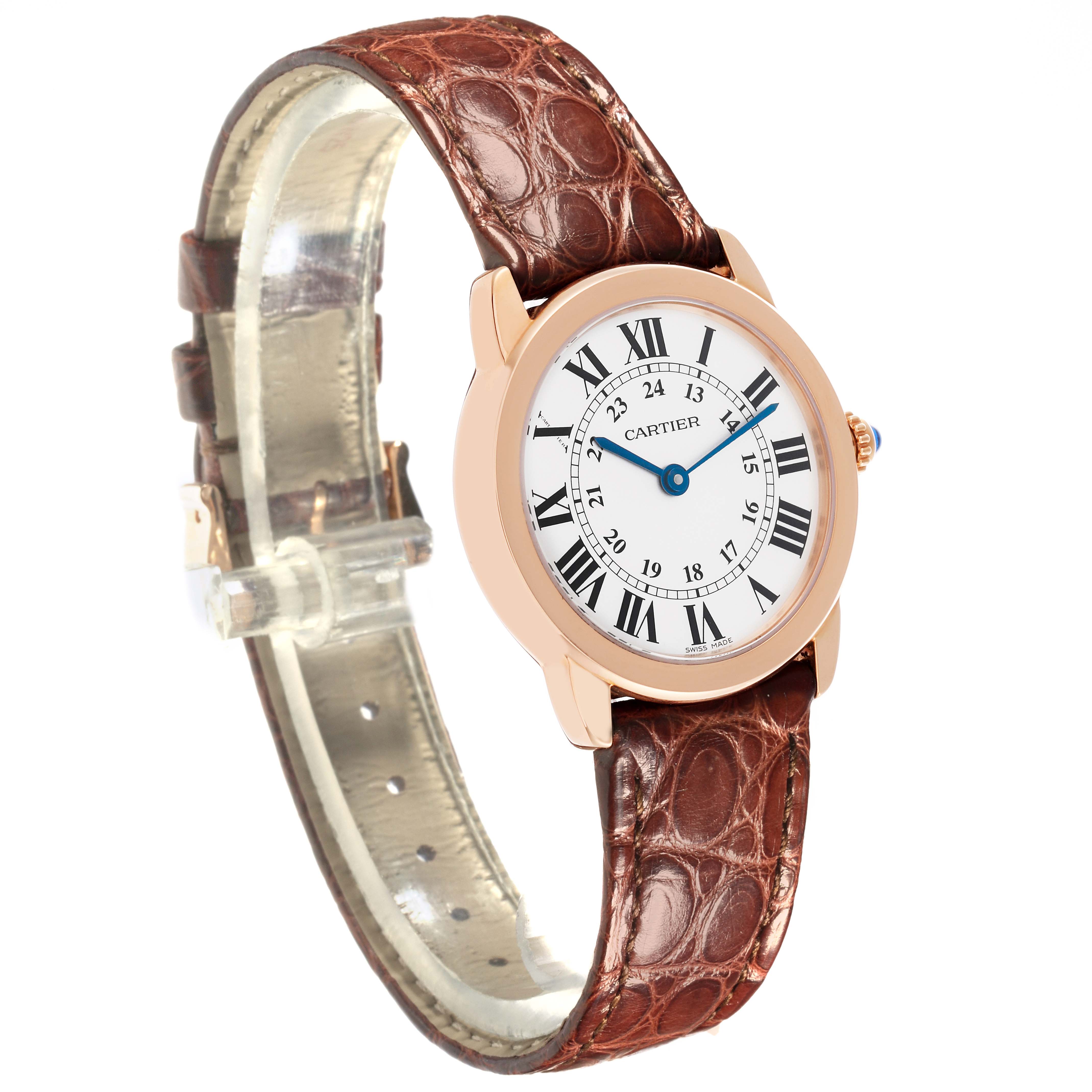 The Cartier Ronde W6701007 Women's Steel and Gold (two tone) Silver Dial W6701007 Women's Steel and Gold (two tone) Silver Dial watch is shown at an angled side view, highlighting its round case, Roman numeral dial, and brown leather strap.