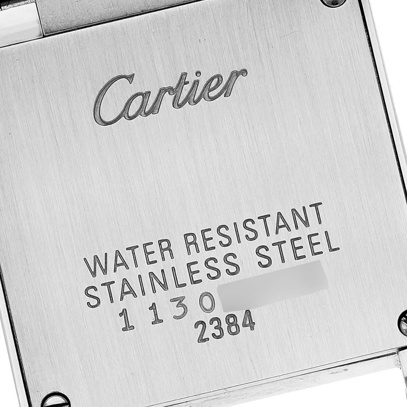 The image shows the back case of a Cartier Tank Française watch, highlighting the brand name and model information.