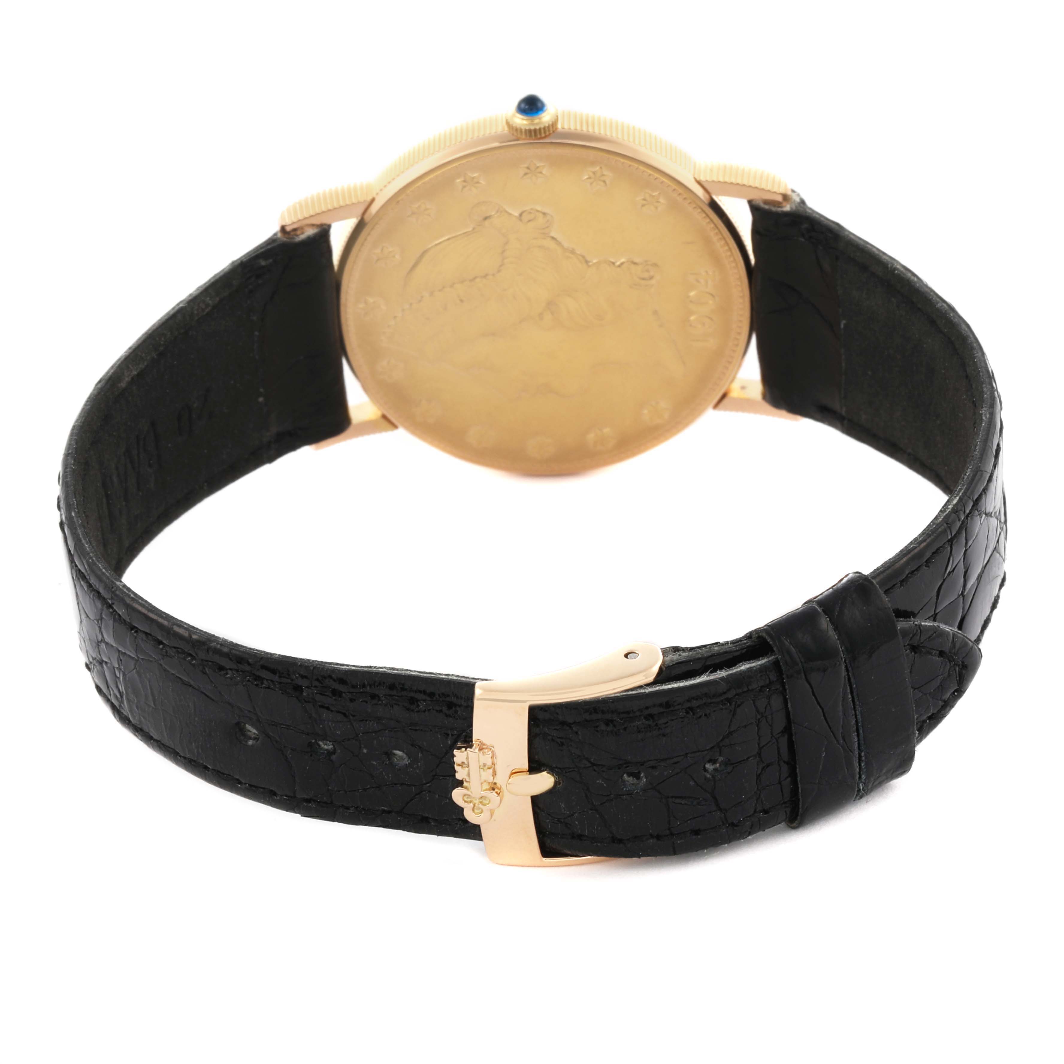 The image shows the back view of a Corum Coin Watch 4414556 Men's Yellow Gold Yellow Dial 4414556 Men's Yellow Gold Yellow Dial, highlighting its gold case and black leather strap.