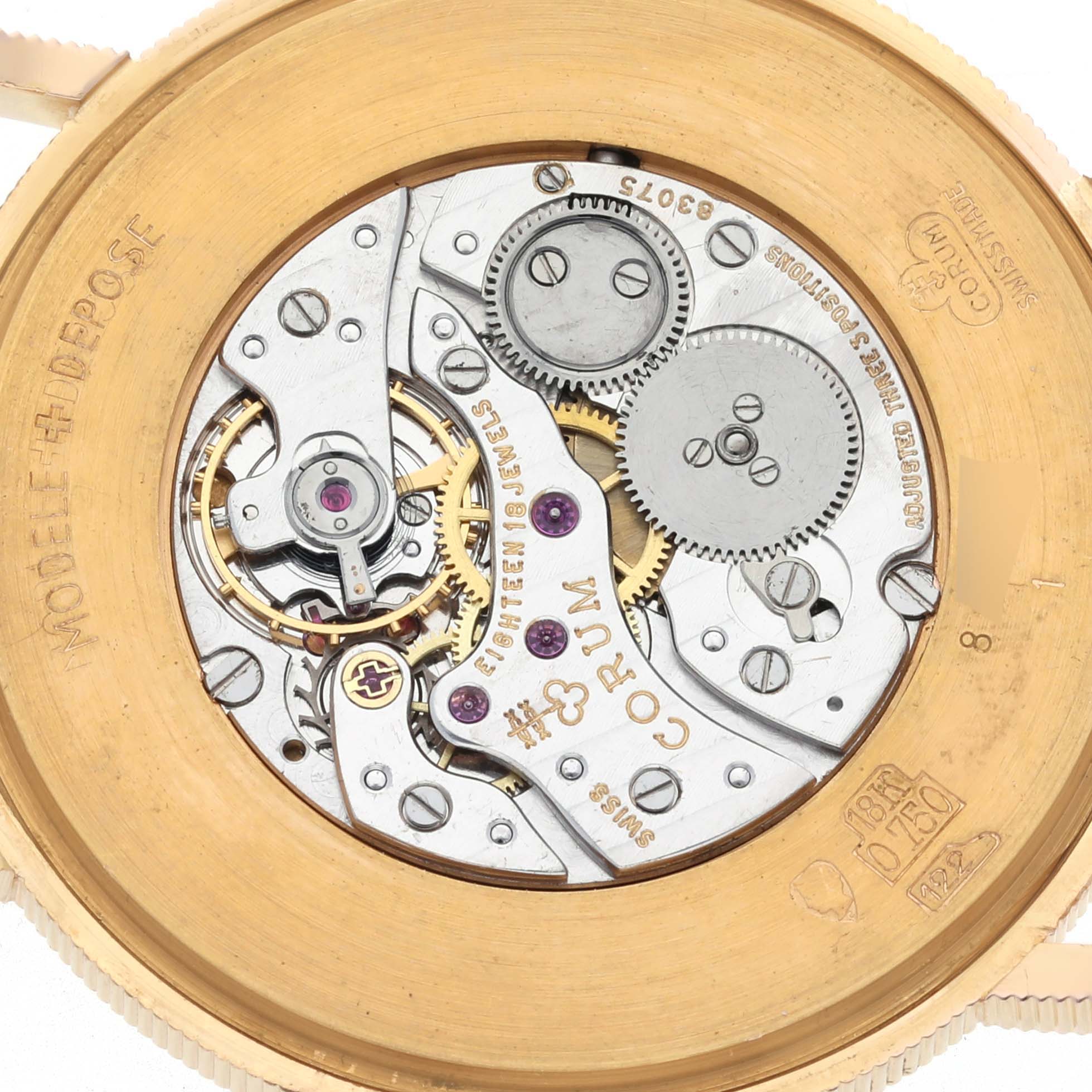 The image shows the movement and internal mechanics of a Corum Coin Watch 4414556 Men's Yellow Gold Yellow Dial 4414556 Men's Yellow Gold Yellow Dial viewed from the back.
