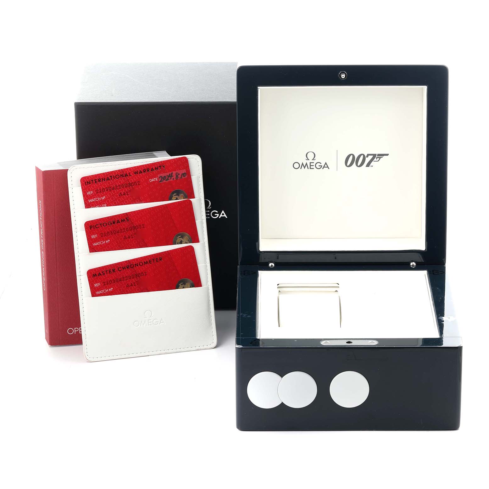 This image shows the Omega Seamaster 210.30.42.20.03.002 Men's Stainless Steel Blue Dial 210.30.42.20.03.002 Men's Stainless Steel Blue Dial 007-themed box, warranty cards, and booklets from a front angle.