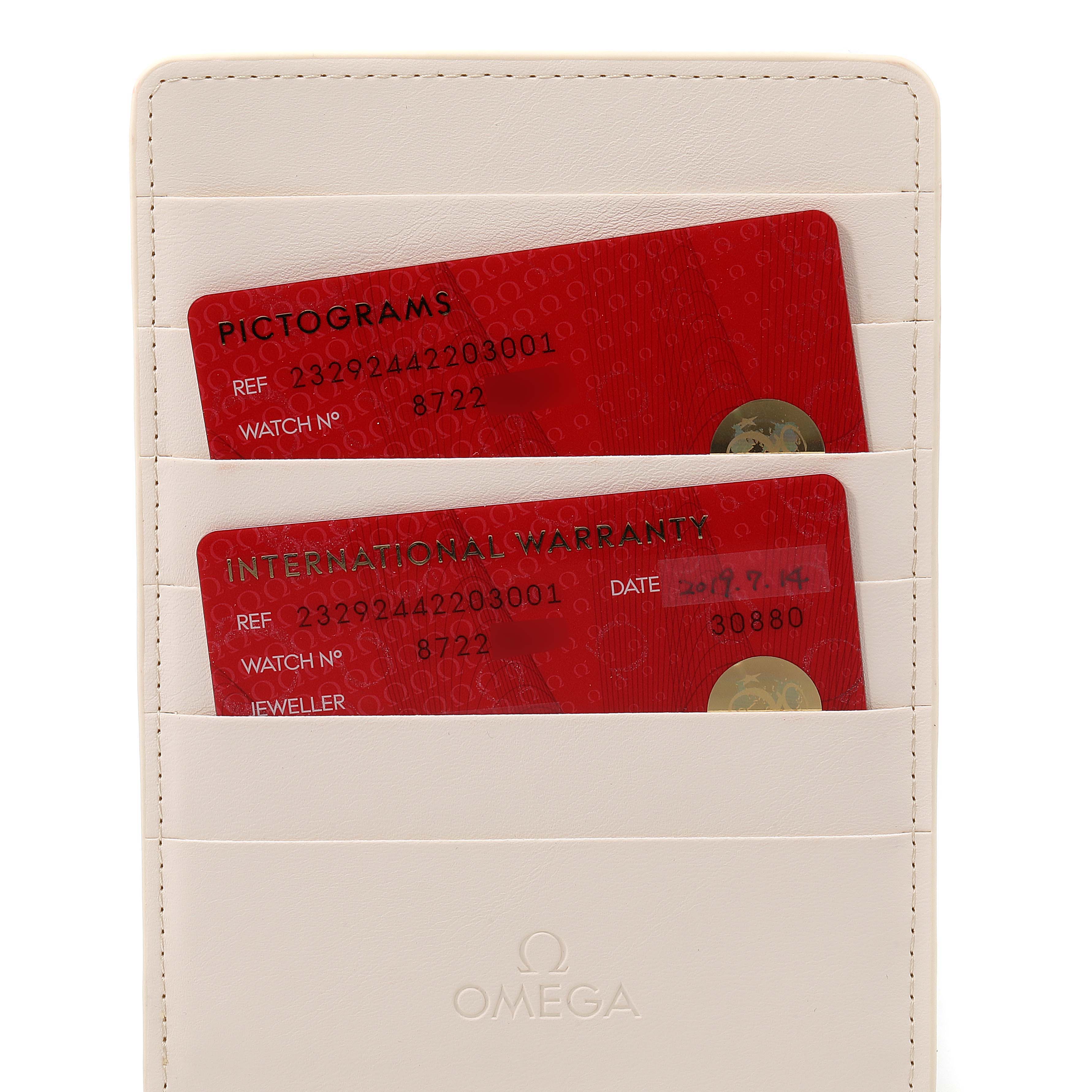 The image shows warranty and pictogram cards for the Omega Planet Ocean 232.92.44.22.03.001 Men's Stainless Steel Blue Dial 232.92.44.22.03.001 Men's Stainless Steel Blue Dial watch, placed in a white cardholder.