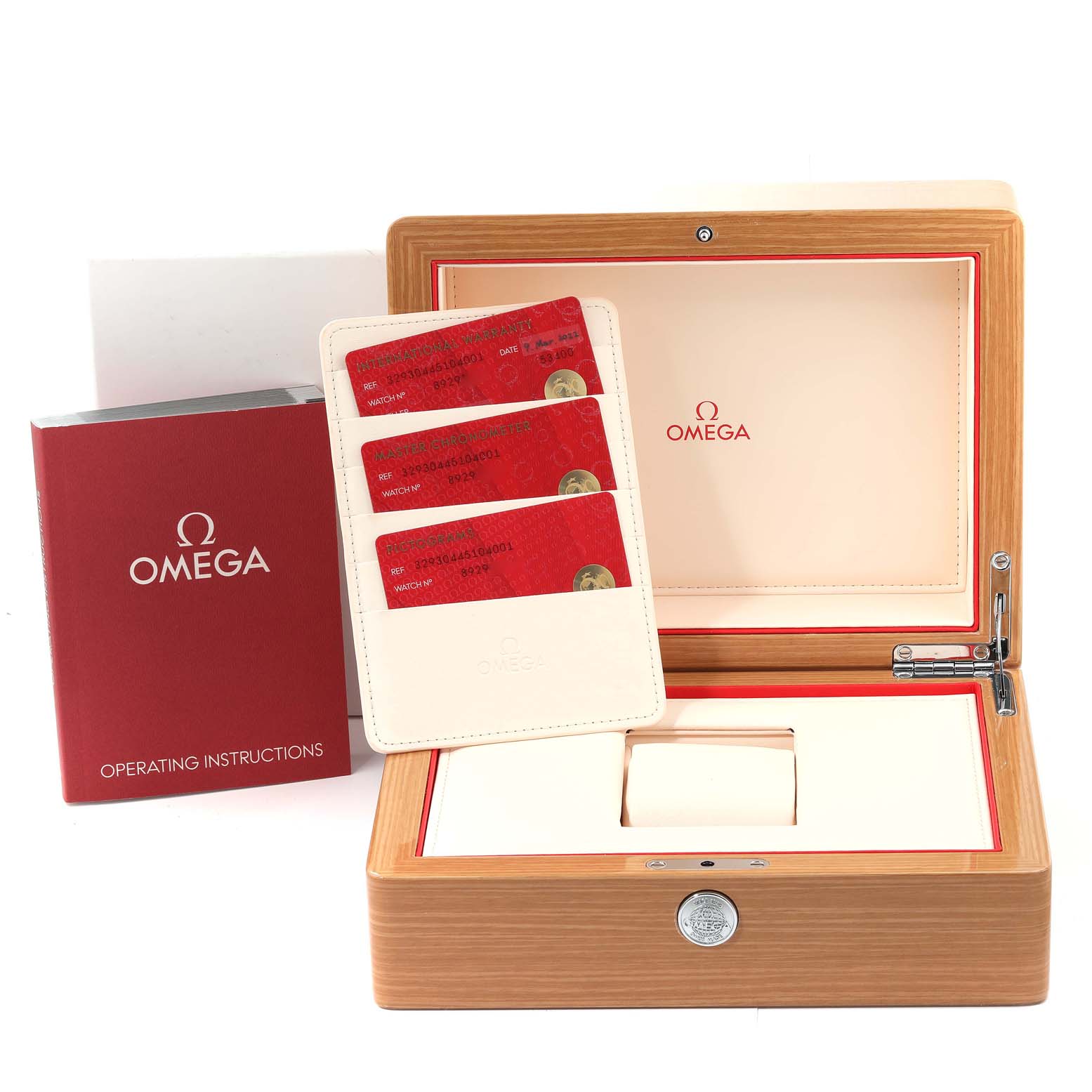 The image shows a wooden box, instruction booklet, and warranty cards for an Omega Speedmaster 329.30.44.51.04.001 Men
s Stainless Steel Silver Dial 329.30.44.51.04.001 Men
s Stainless Steel Silver Dial watch.