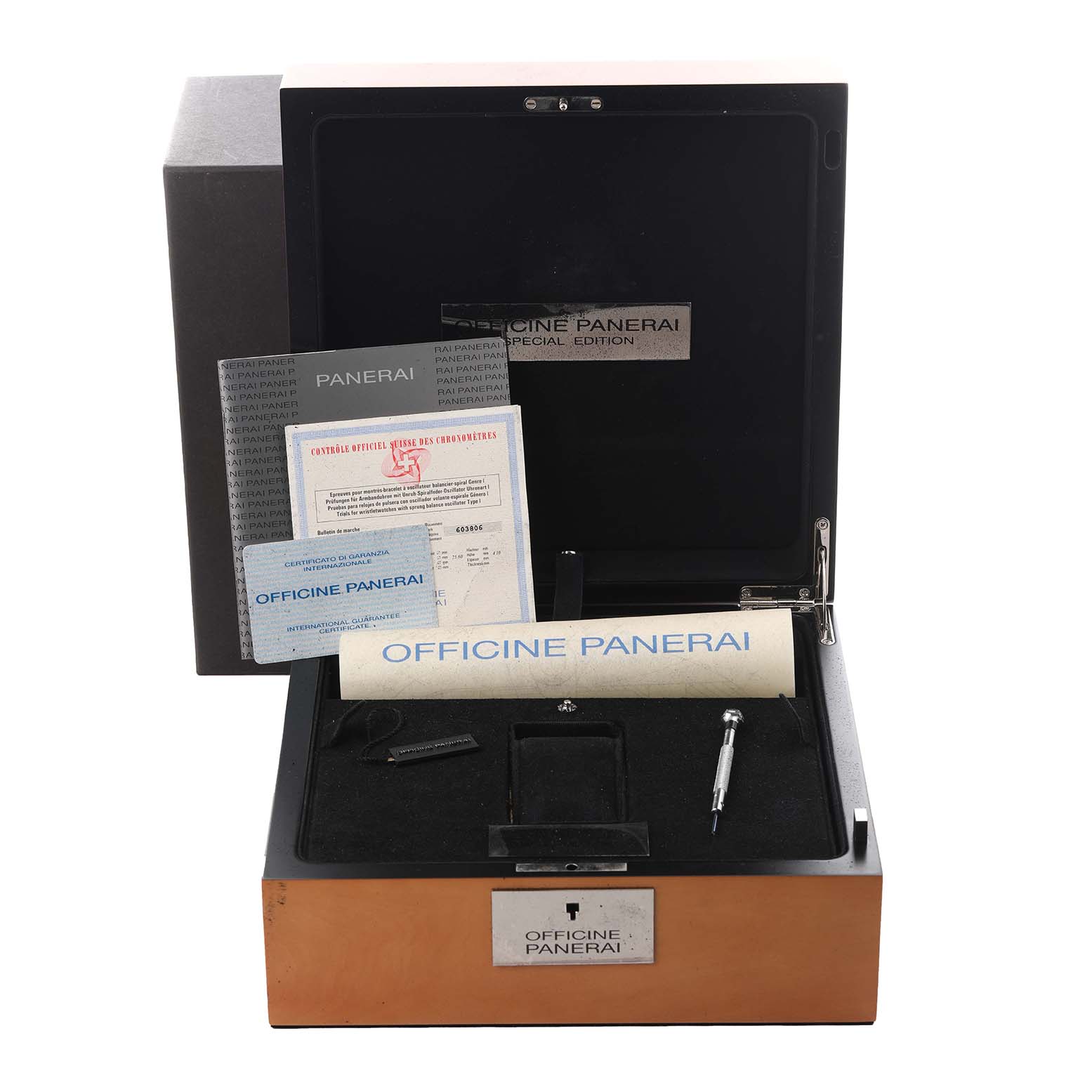 The image shows a Panerai Luminor PAM00029 Men's Stainless Steel Black Dial PAM00029 Men's Stainless Steel Black Dial box with accessories like a screwdriver, documents, and a special edition plaque.