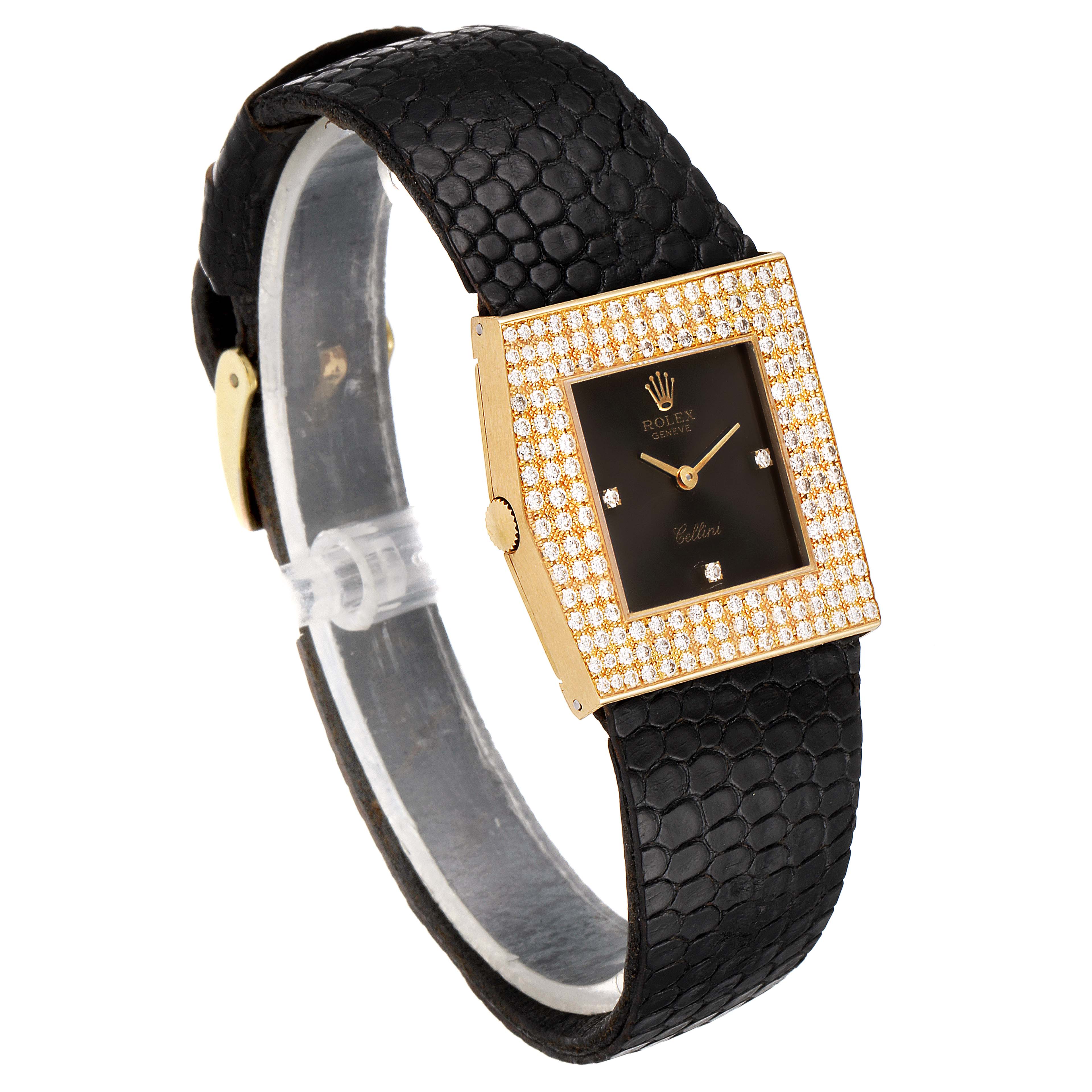 The Rolex Cellini 4031 Men's Yellow Gold Grey Dial 4031 Men's Yellow Gold Grey Dial watch is shown at a tilted angle, highlighting the black strap, gold bezel with diamonds, and square dial.