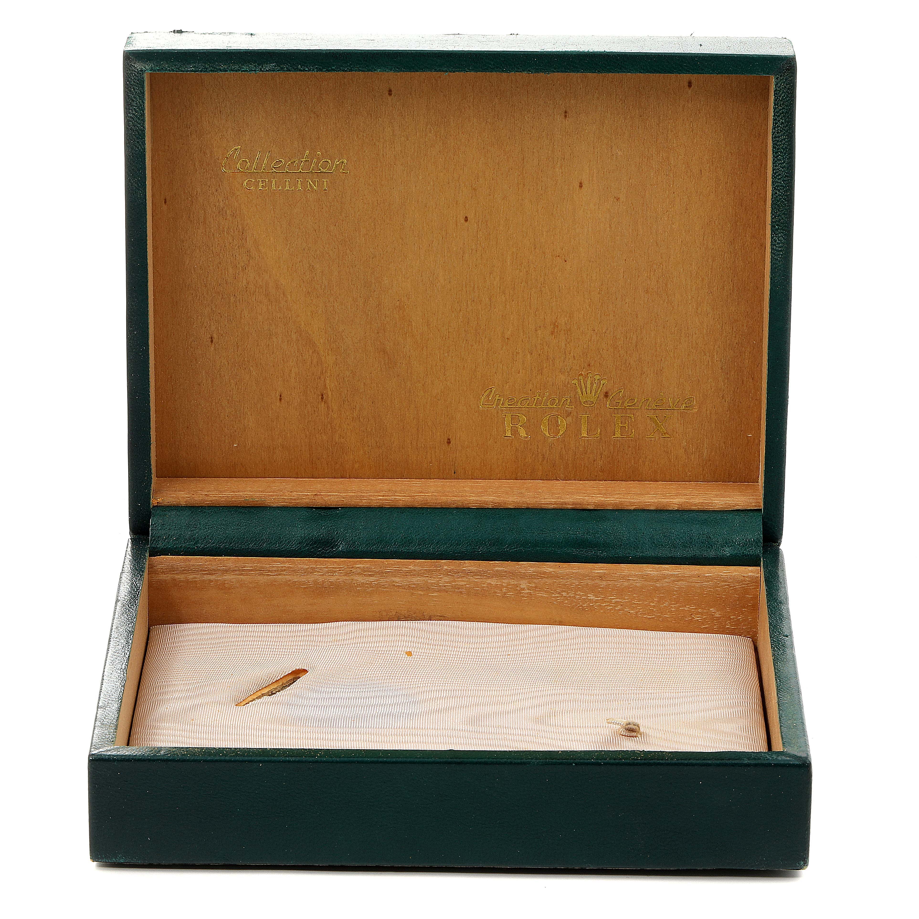 This image depicts an open Rolex Cellini 4031 Men's Yellow Gold Grey Dial 4031 Men's Yellow Gold Grey Dial watch box, showing the interior lining and brand logo.