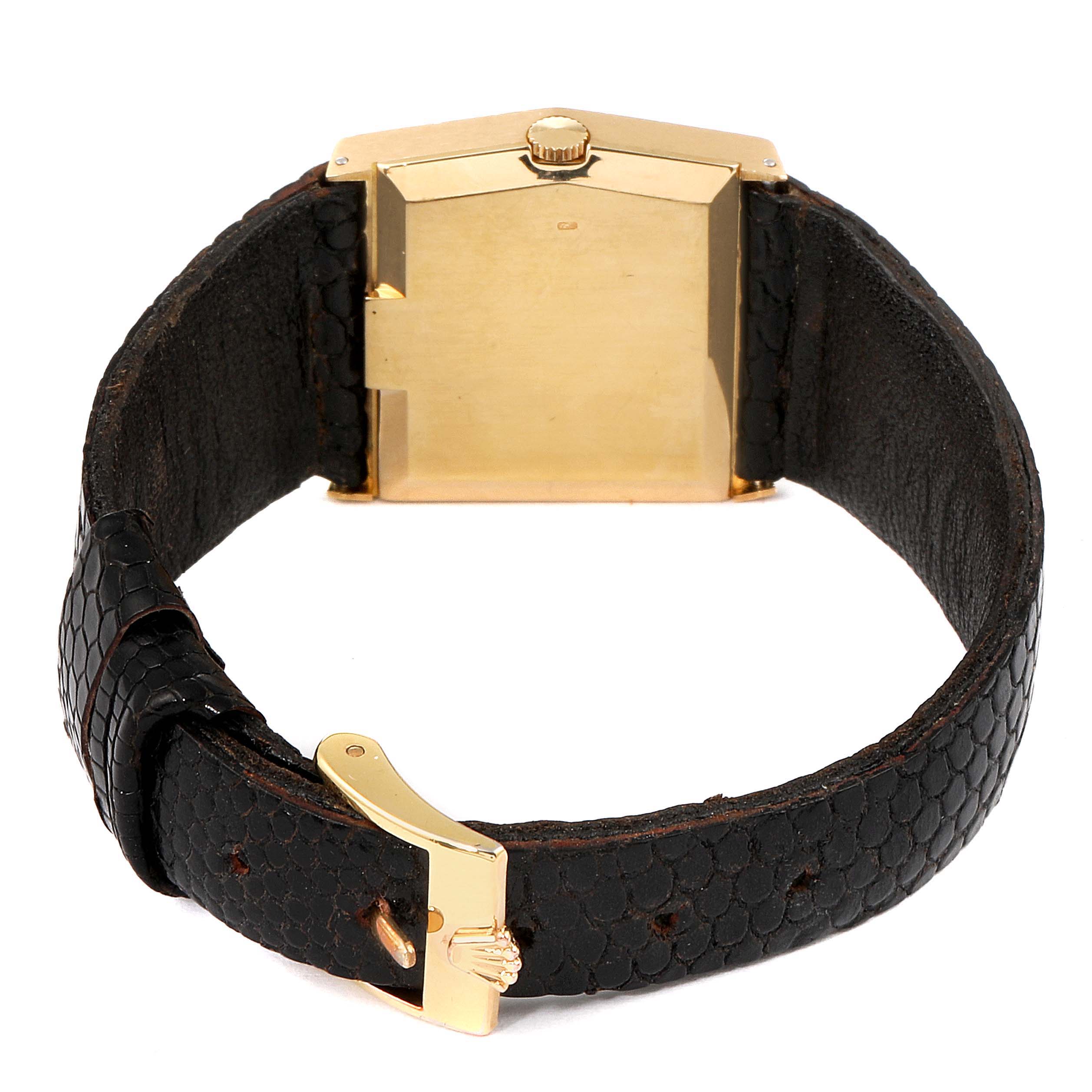 This image shows the back side of a Rolex Cellini 4031 Men's Yellow Gold Grey Dial 4031 Men's Yellow Gold Grey Dial watch, highlighting its gold case, crown, and black leather strap with a gold buckle.