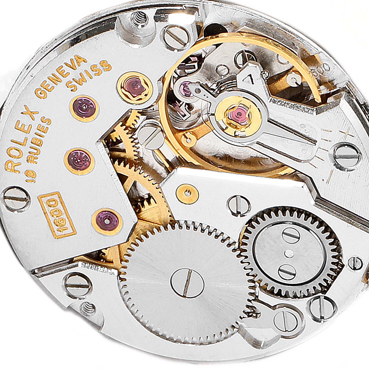 This image shows the internal mechanical movement of a Rolex Cellini 4031 Men's Yellow Gold Grey Dial 4031 Men's Yellow Gold Grey Dial watch, focusing on the gears and intricate components.