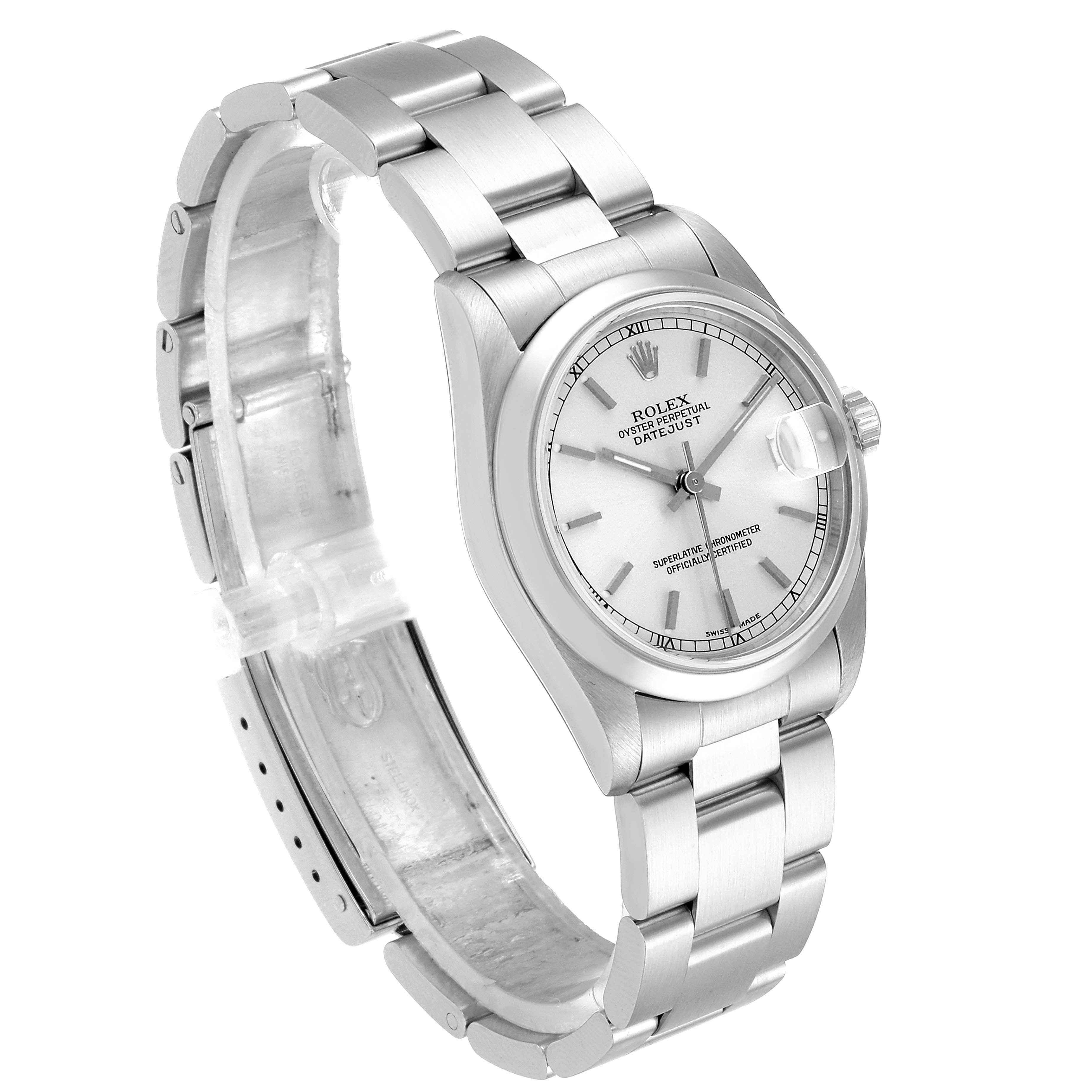 The image shows a Rolex Mid-Size 78240 Women
s Stainless Steel Silver Dial 78240 Women
s Stainless Steel Silver Dial watch in a three-quarter angle, highlighting its metal bracelet, case, and dial.